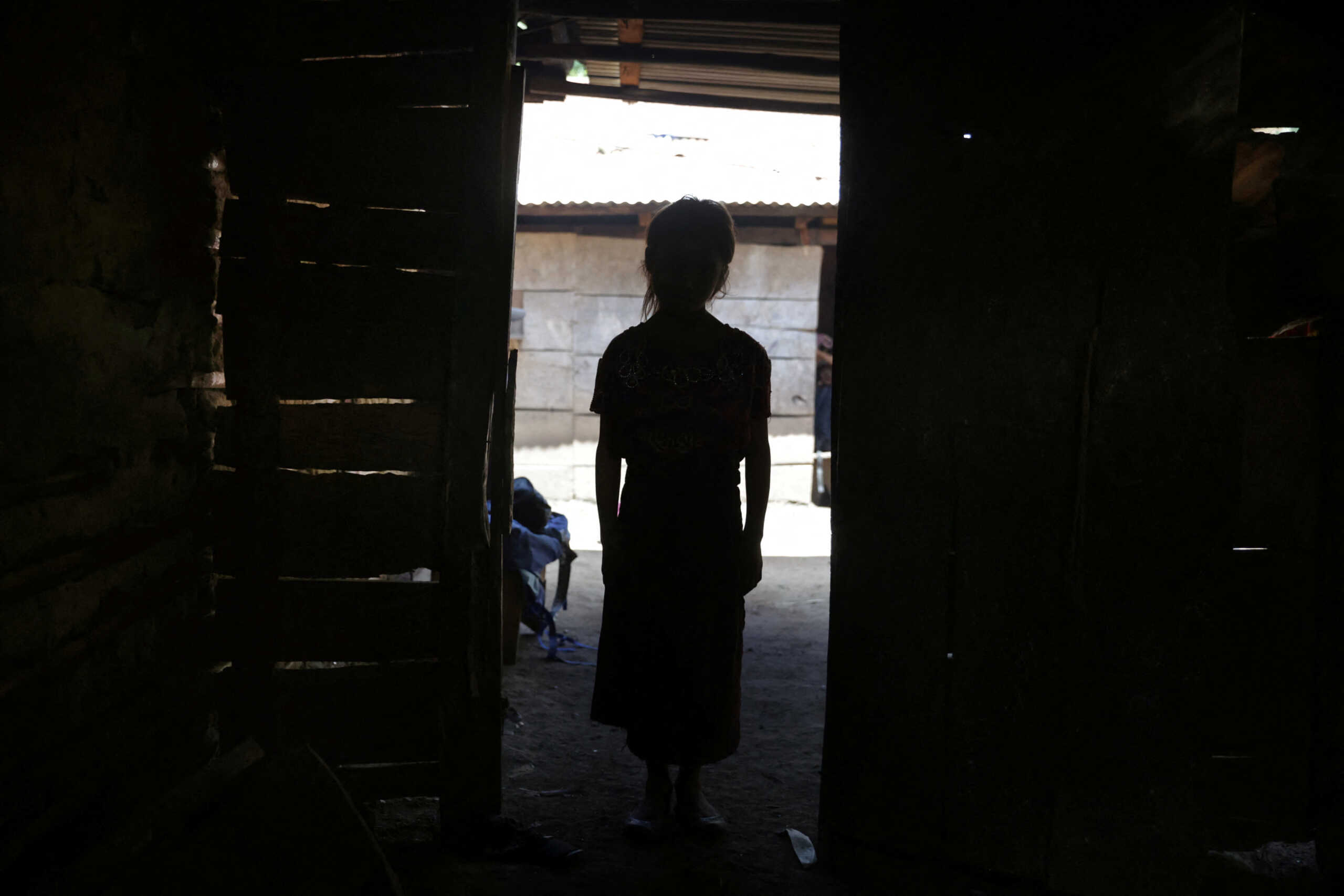 Maria Concepcion Rodriguez's daughter Claudia Sis Rodriguez, 10, poses for a picture at the entrance of her house in El Aguacate village in Baja Verapaz, Guatemala August 16, 2023. Maria stayed home to care for her six children while her husband headed out for a day of work, one of maybe two opportunities he will have that week to collect firewood and earn some money. They survive on less than 2USD a day, barely enough to purchase something basic to eat, like a packet of noodles, if what they grow falls short. Sometimes there is too little food for everyone. "There has been a lot of drought in recent years," Maria said. Nearly all of Maria's six children have suffered severe malnourishment. They appear much younger than their years.      REUTERS