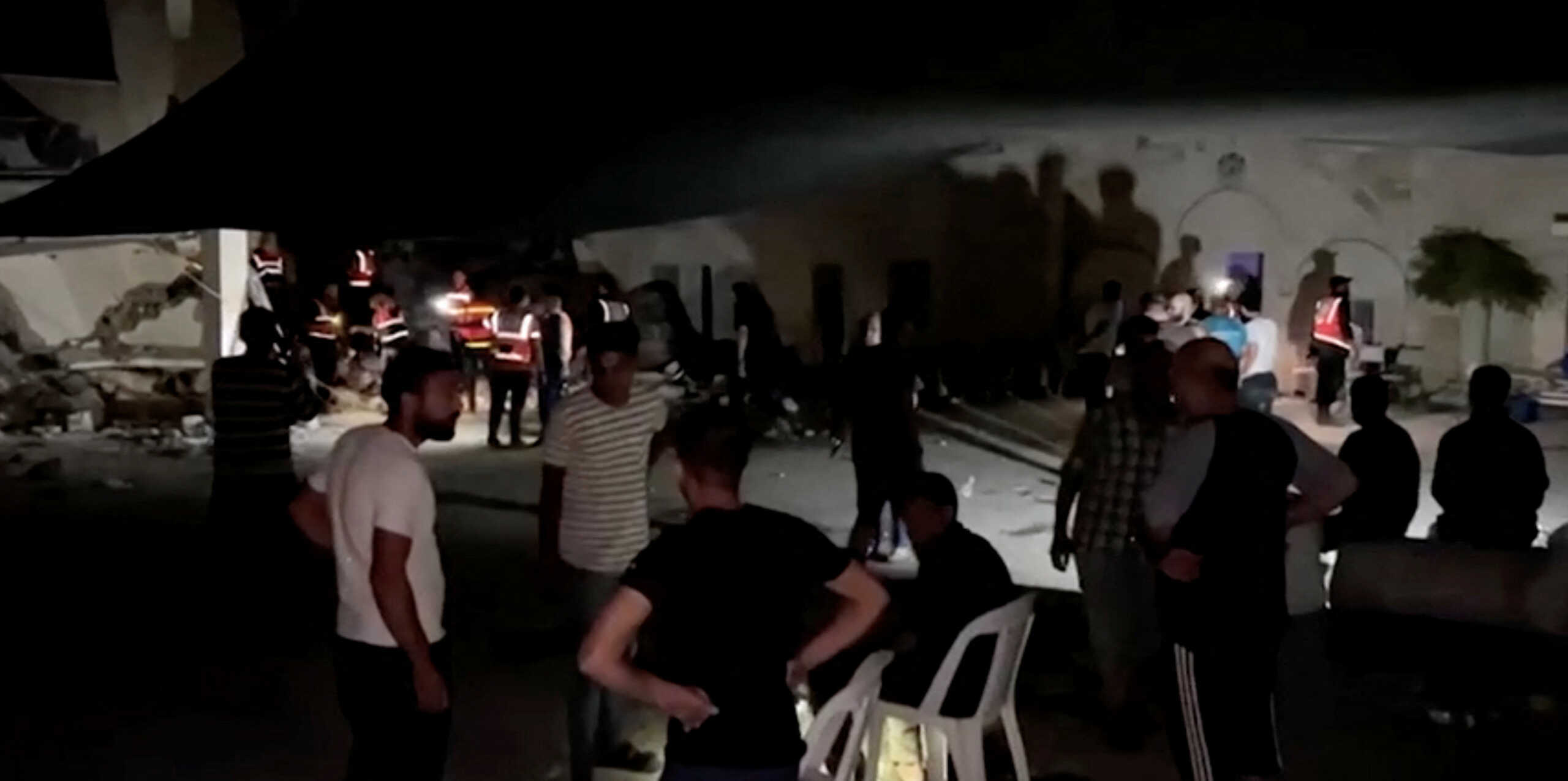 Palestinians inspect the Greek Orthodox Saint Porphyrius Church that was damaged by an Israeli strike, where Palestinians who fled their homes take shelter, in Gaza City, in this screen grab taken from a video obtained by Reuters on October 20, 2023. REUTERS