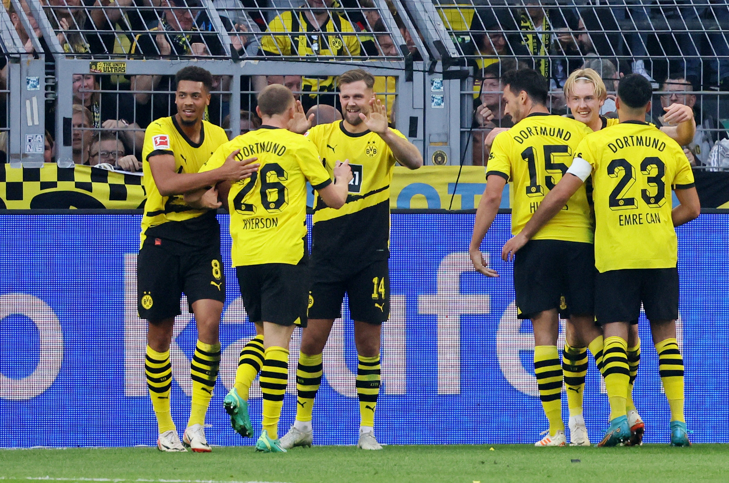 Soccer Football - Bundesliga - Borussia Dortmund v Union Berlin - Signal Iduna Park, Dortmund, Germany - October 7, 2023 Borussia Dortmund's Julian Brandt celebrates scoring their third goal with teammates REUTERS