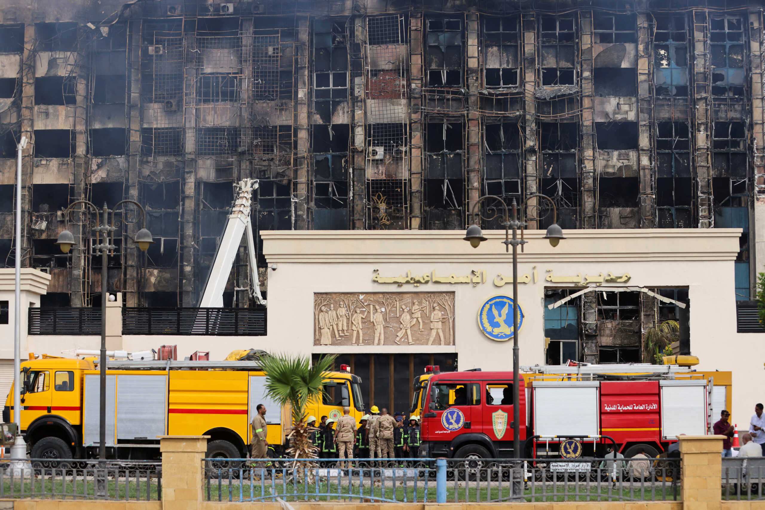 Efforts are made to douse a fire that broke out at a police facility, in Ismailia, Egypt October 2, 2023. REUTERS