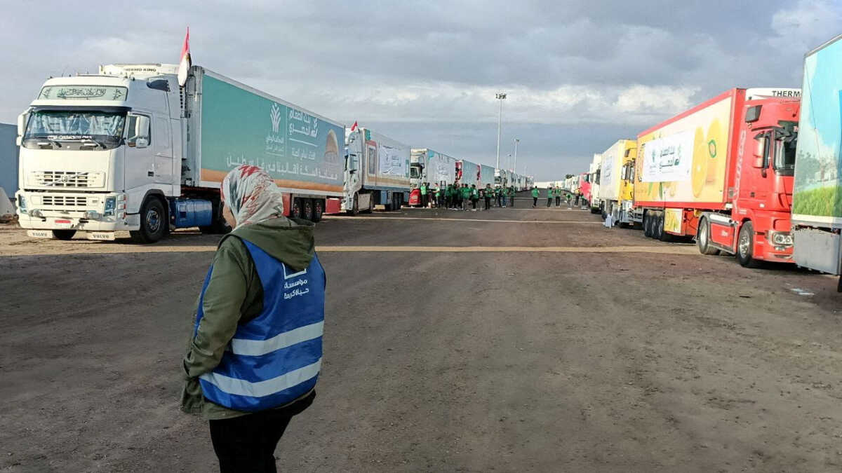 FILE PHOTO: Trucks carrying humanitarian aid from Egyptian NGOs for Palestinians, wait for the reopening of the Rafah crossing at the Egyptian side, to enter Gaza, amid the ongoing conflict between Israel and the Palestinian Islamist group Hamas, in Rafah, Egypt October 17, 2023. REUTERS