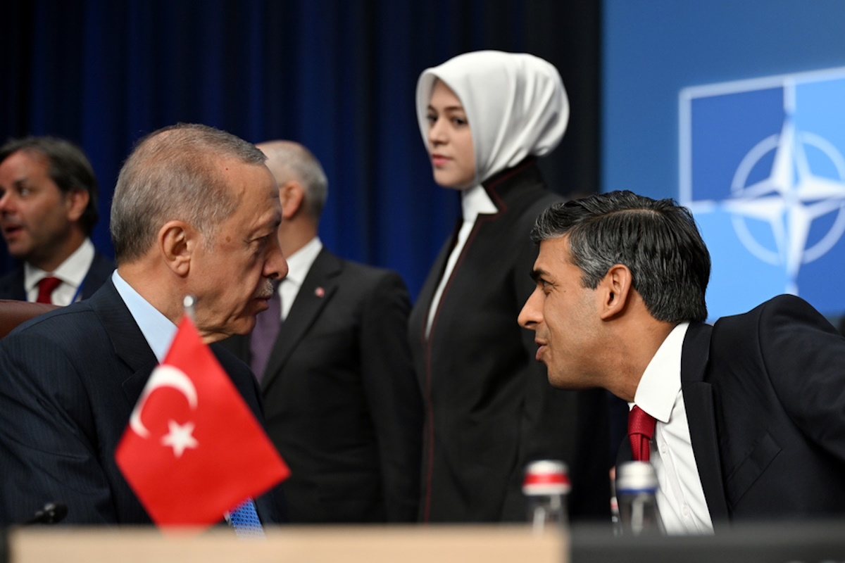 epa10739592 Britain's Prime Minister Rishi Sunak (R) speaks with the President of Turkey Recep Tayyip Erdogan (L) during the meeting of the North Atlantic Council with Sweden at the NATO ​summit in Vilnius, Lithuania, 11 July 2023. The North Atlantic Treaty Organization (NATO) Summit takes place in Vilnius on 11 and 12 July 2023 with the alliance's leaders expected to adopt new defence plans.  EPA