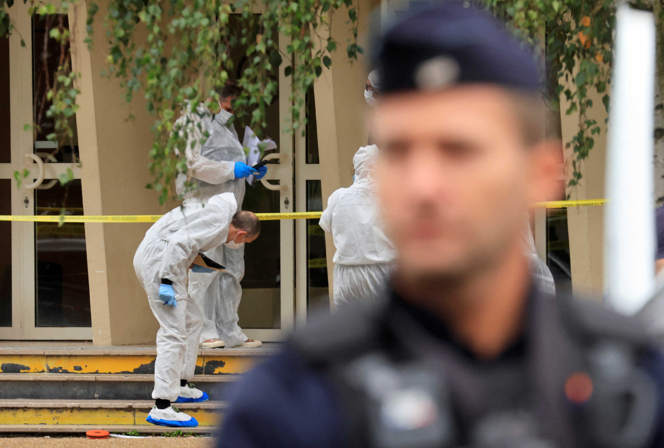 French scientific police work on the area after a teacher was killed and several people injured in a knife attack at the Lycee Gambetta-Carnot high school in Arras, northern France, October 13, 2023. REUTERS