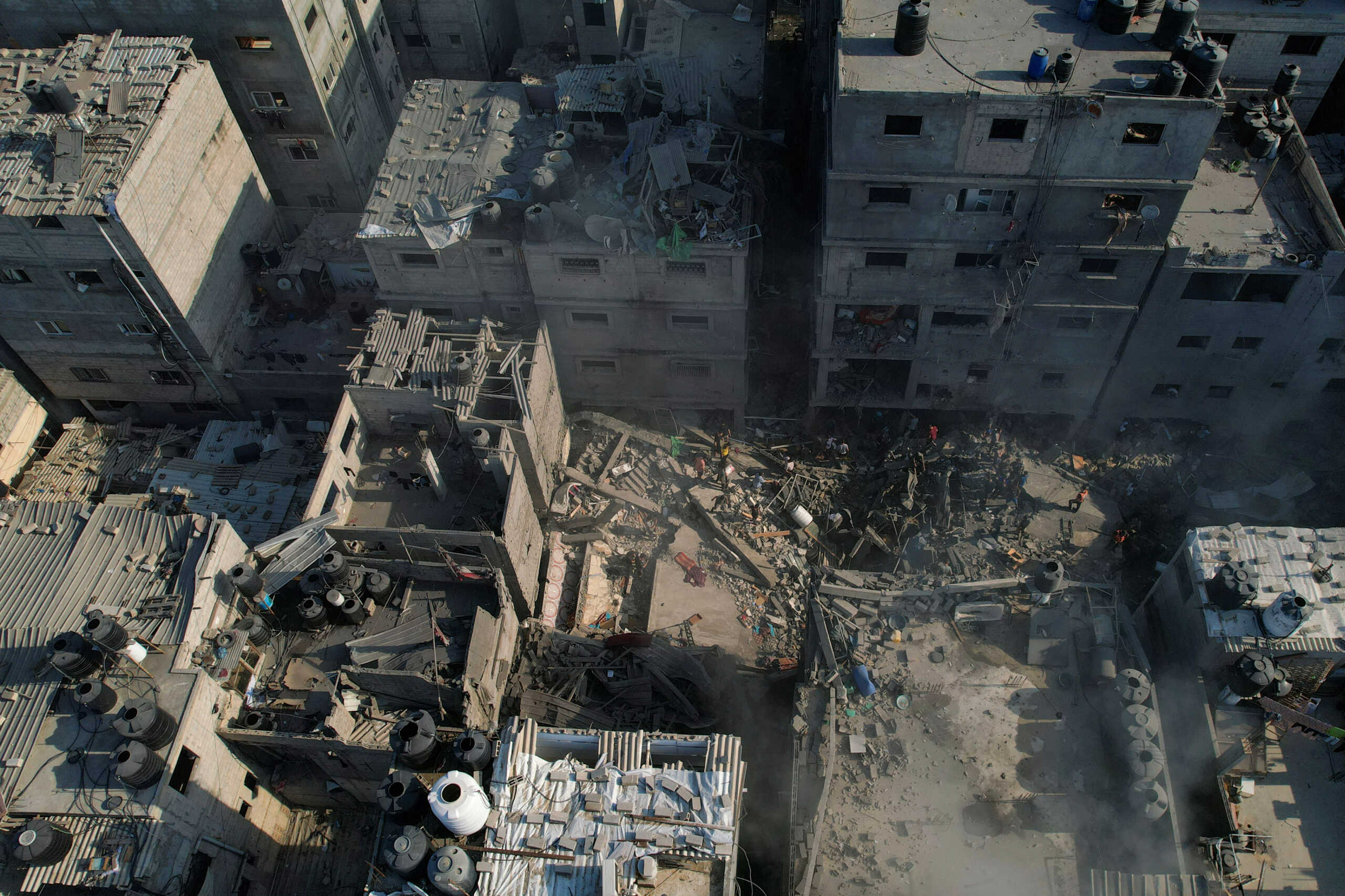 A view shows the ruins of Palestinian houses hit by Israeli strikes at al-Shati (Beach) refugee camp, in Gaza City, October 12, 2023. REUTERS
