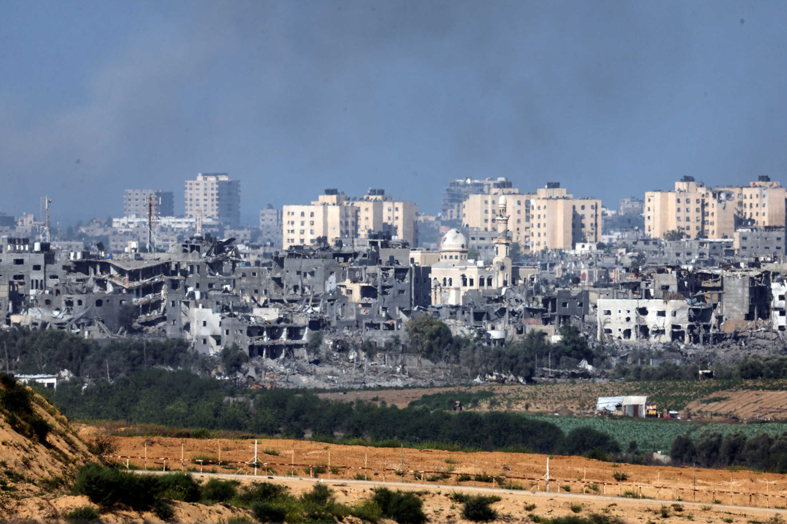 A view shows destroyed buildings in the Gaza Strip as seen from Israel's border with the Gaza Strip, in southern Israel October 15, 2023. REUTERS