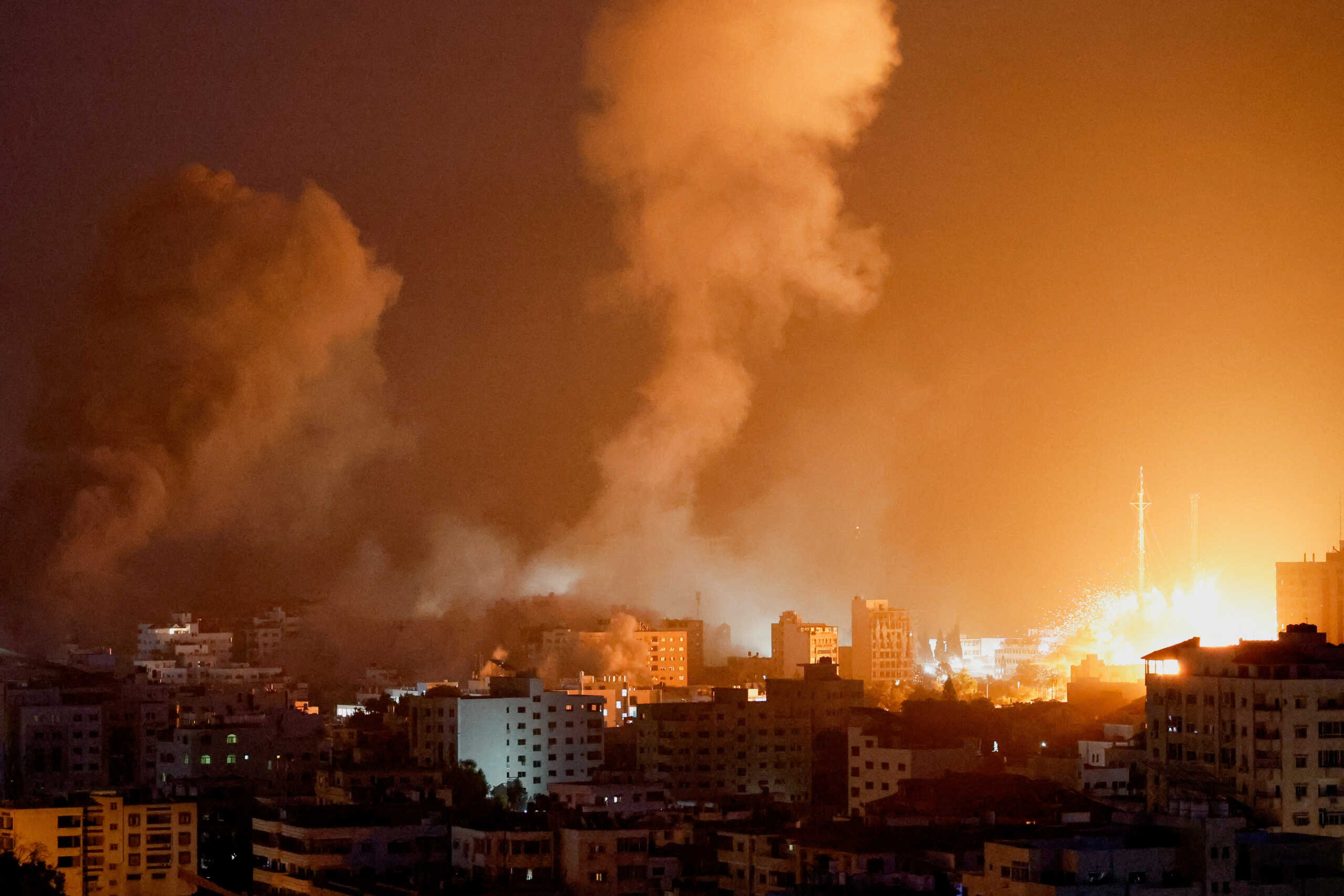 Flames and smoke billow during Israeli strikes in Gaza, October 9, 2023. REUTERS