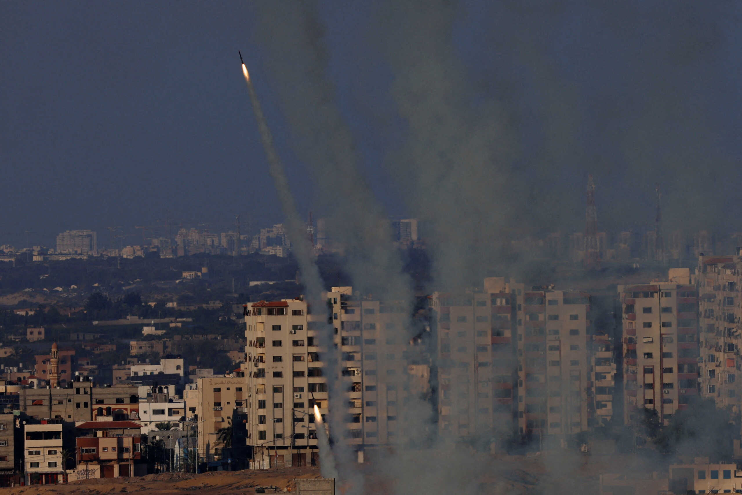 FILE PHOTO: Rockets are fired from Gaza towards Israel, in Gaza, October 10, 2023. REUTERS
