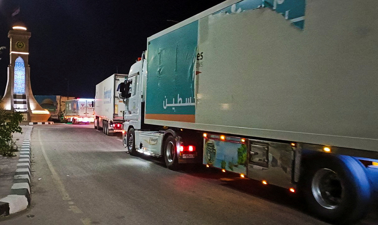 A convoy of trucks carrying humanitarian aid from Egyptian NGOs for Palestinians start to move from Al-Arish to Rafah city as they wait for an agreement on the opening on the Rafah border crossing to enter Gaza, amid the ongoing conflict between Israel and Hamas, in the city of Al-Arish, Sinai peninsula, Egypt, October 17, 2023. REUTERS