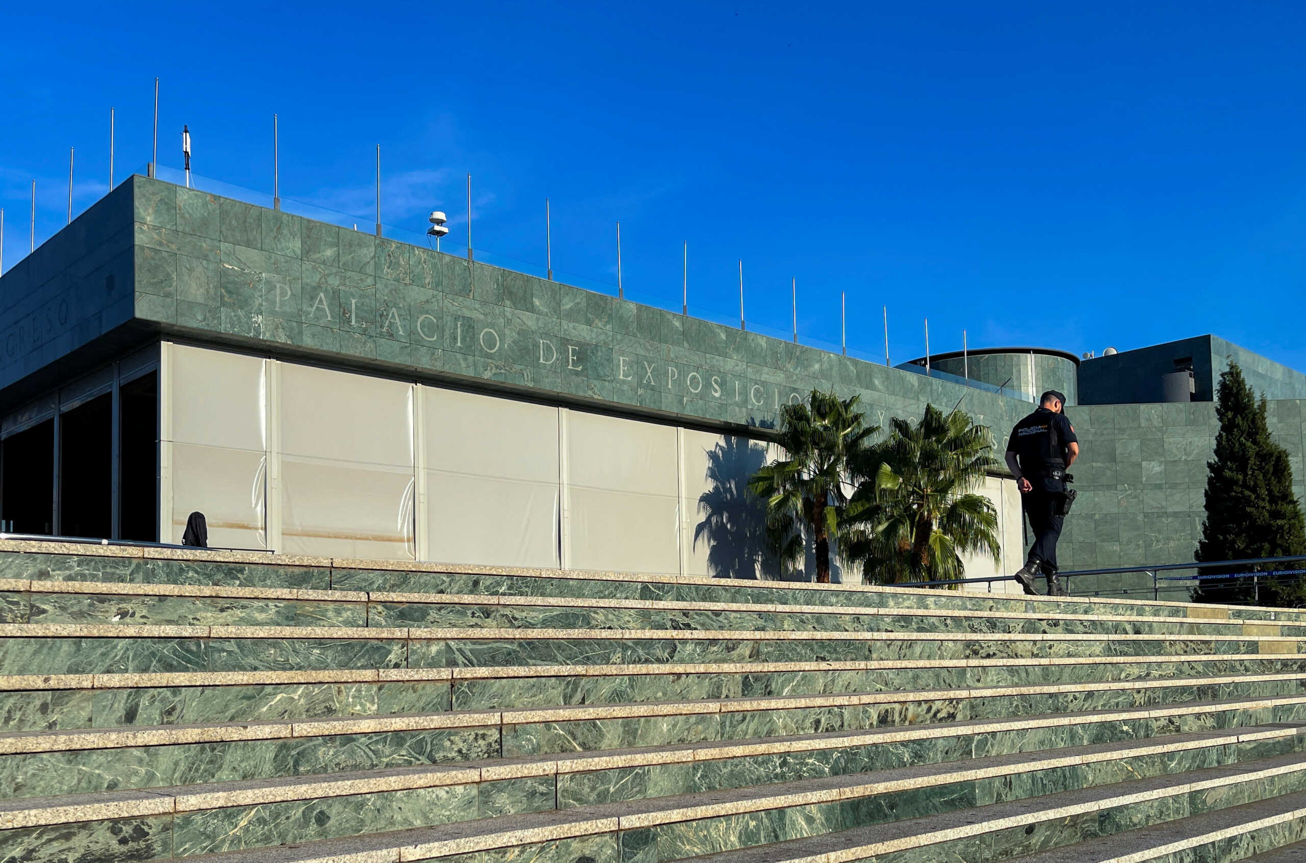 A Spanish national policeman guards outside the Congress Palace ahead of the European Political Community summit in Granada, Spain, October 4, 2023. REUTERS