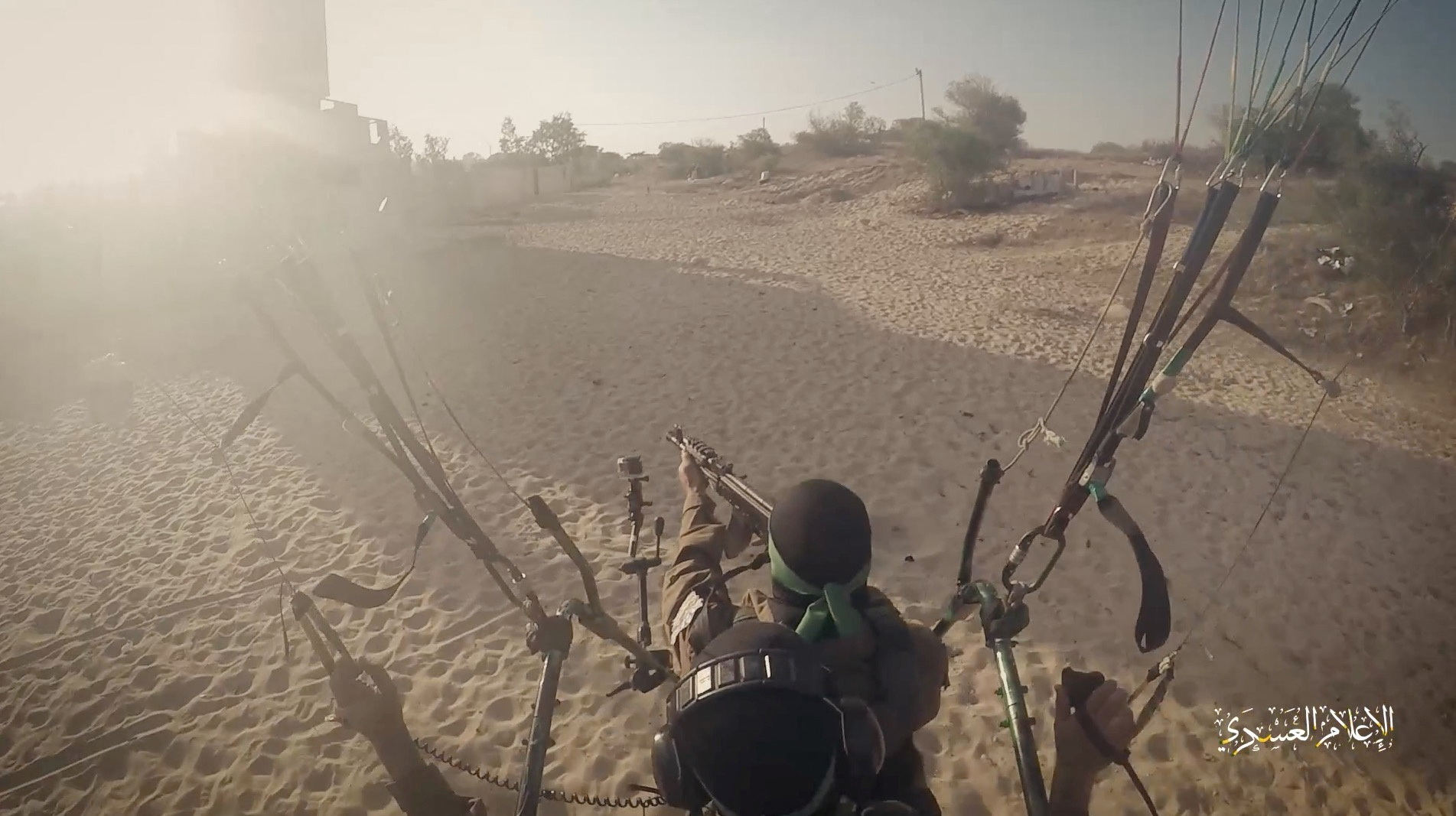 Hamas?s armed wing Izz el-Deen al-Qassam Brigades train with paragliders as they prepare for an armed air assault, in this screengrab obtained from a social media video released on October 7, 2023. Izz el-Deen al-Qassam Brigades via Telegram