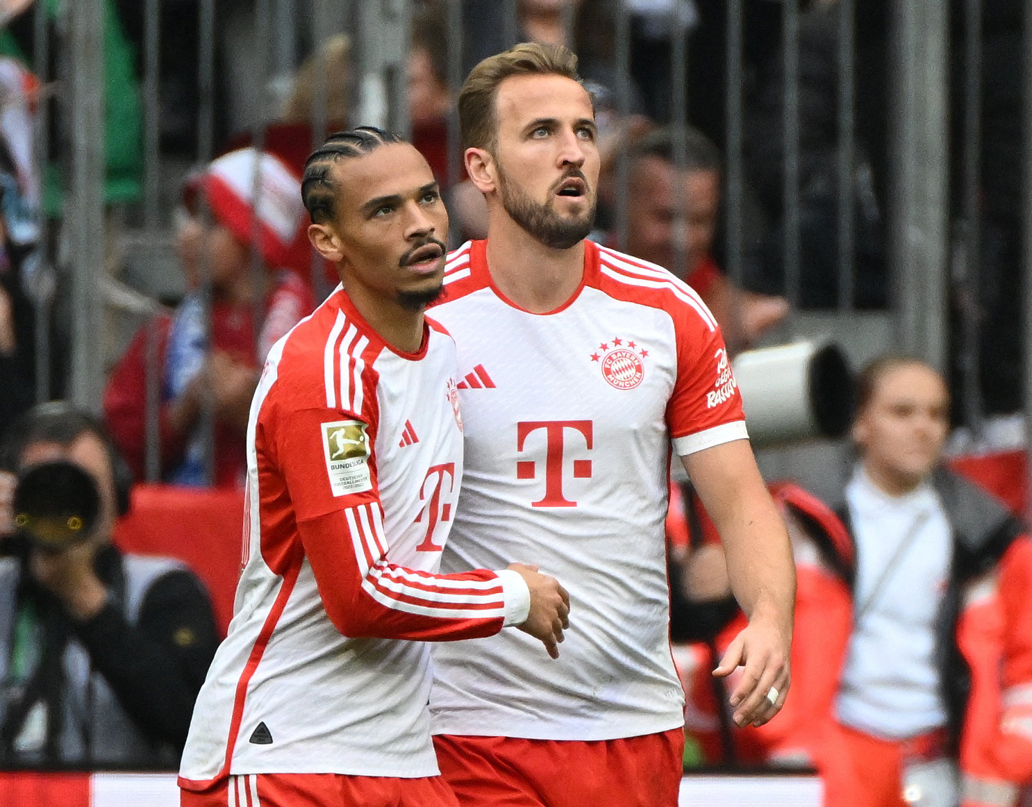 Soccer Football - Bundesliga - Bayern Munich v SV Darmstadt 98 - Allianz Arena, Munich, Germany - October 28, 2023  Bayern Munich's Harry Kane celebrates scoring their first goal with Leroy Sane REUTERS