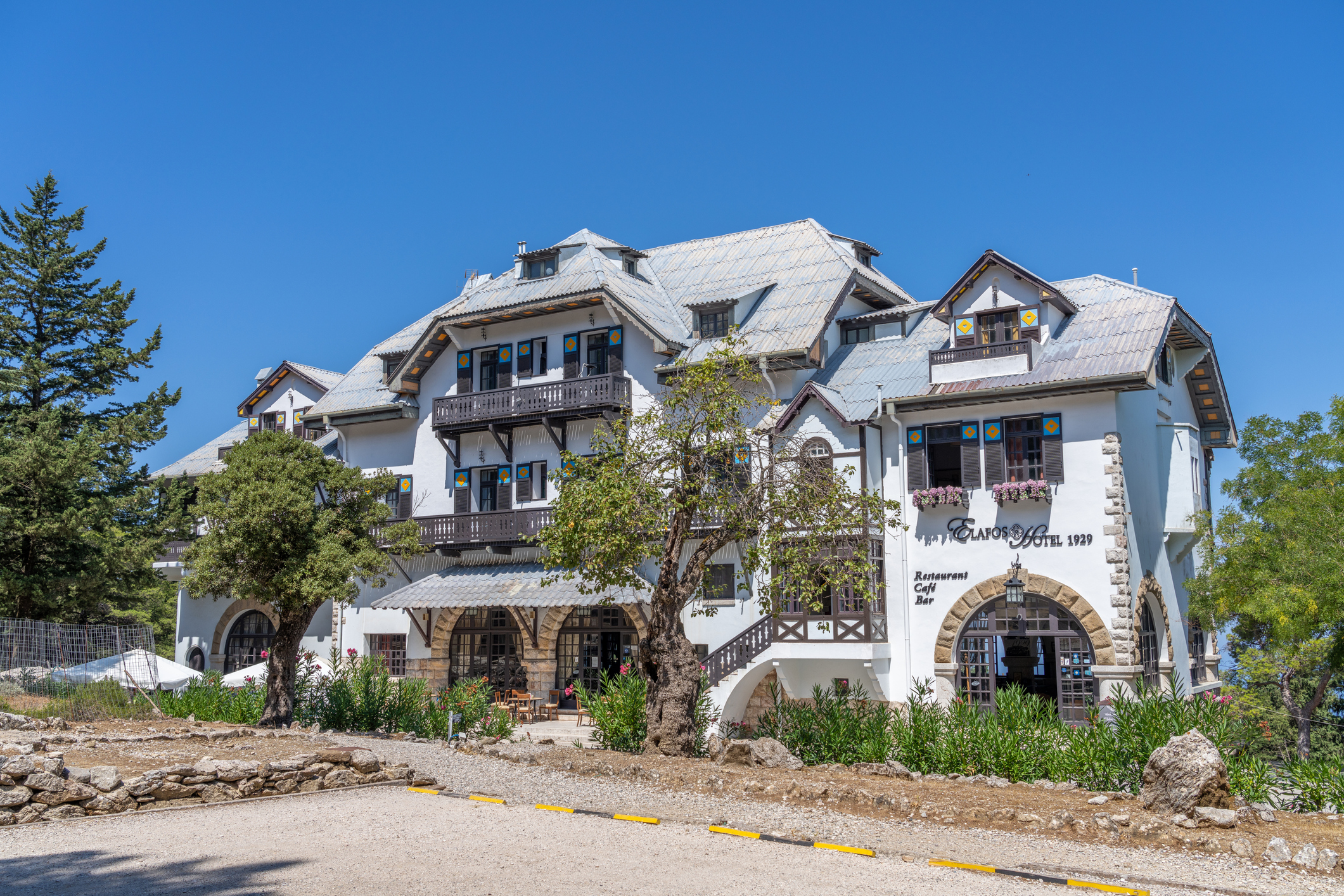 Rhodes, Greece - September 8th 2022: Hotel Elafos, built by an Italian architect in 1929 in the town of Profitis Ilias on the Greek Island of Rhodes.  The hotel was built close to a building known as Mussolini's house and is believed to be where the Italian Dictator was to live after the second world war had finished.