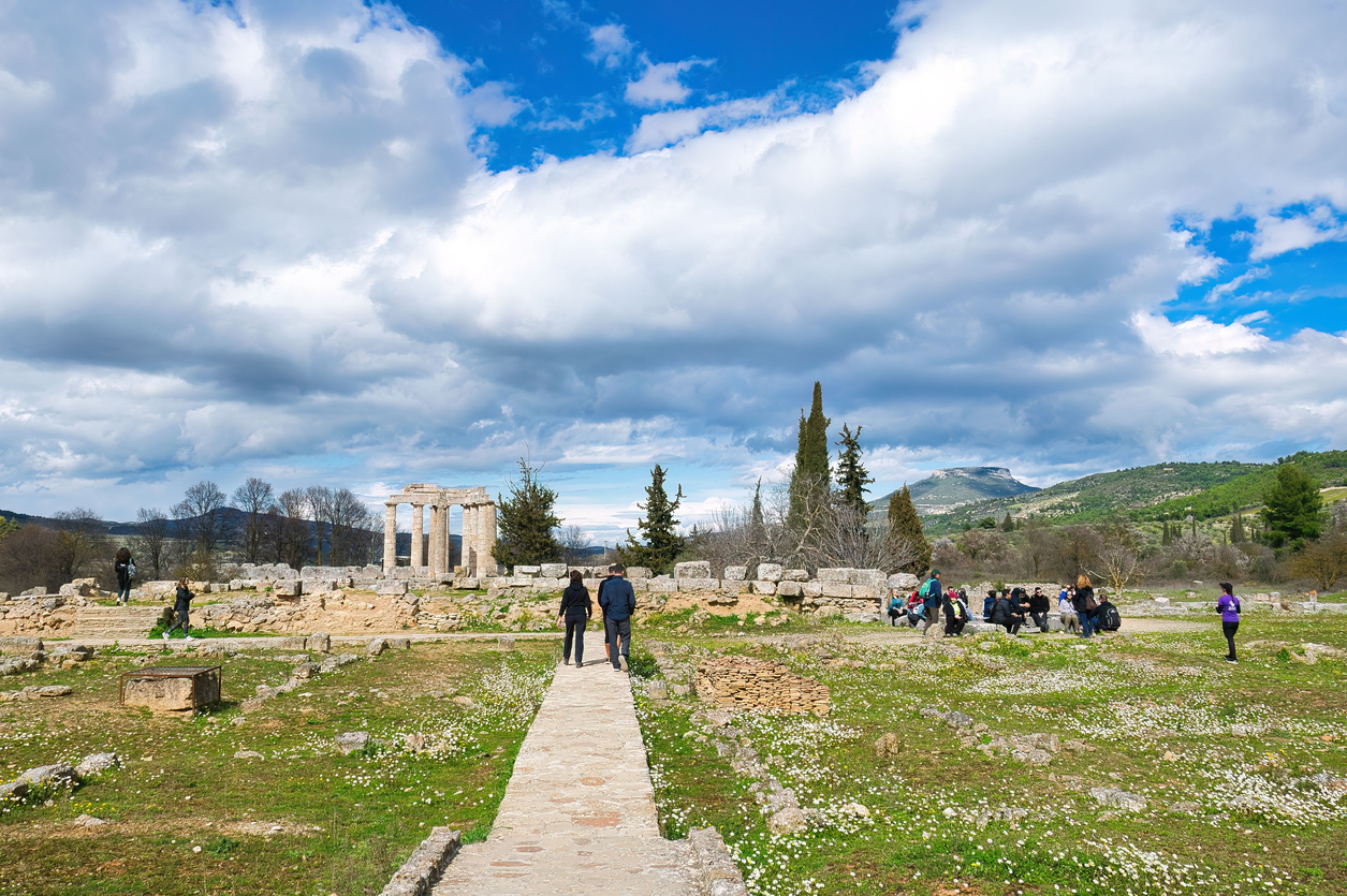 Nemea, Greece – March 08, 2023: Doric style columns and ruins from Temple of ancient Greece. temple of Zeus in ancient Nemea ,Nemea ,Greece. the restored temple of Zeus