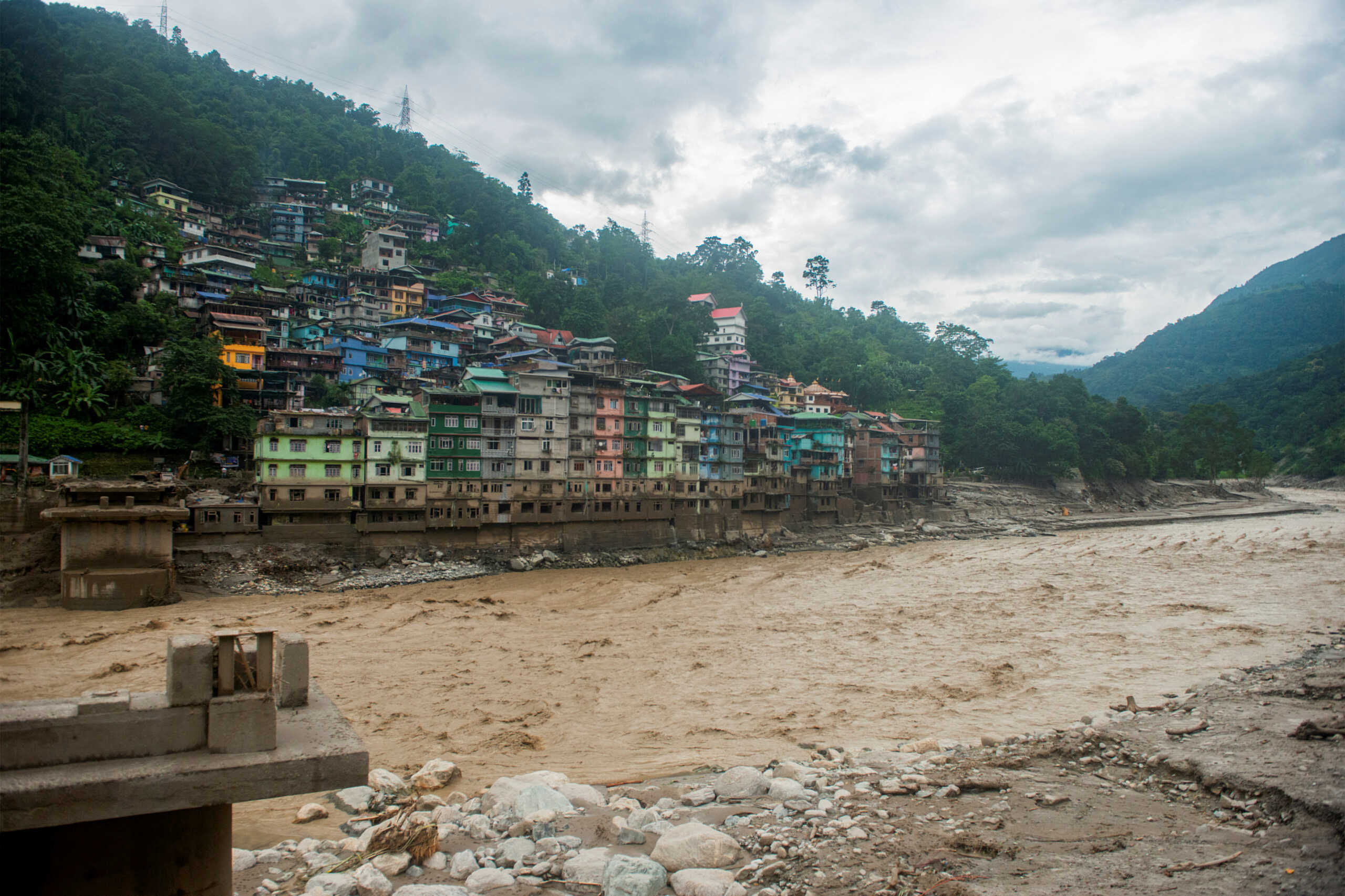 Remains of the bridge connecting Adarsh gaon with Singtam is pictured along the bank of Teesta River at Singtam in Sikkim, India October 5, 2023. REUTERS