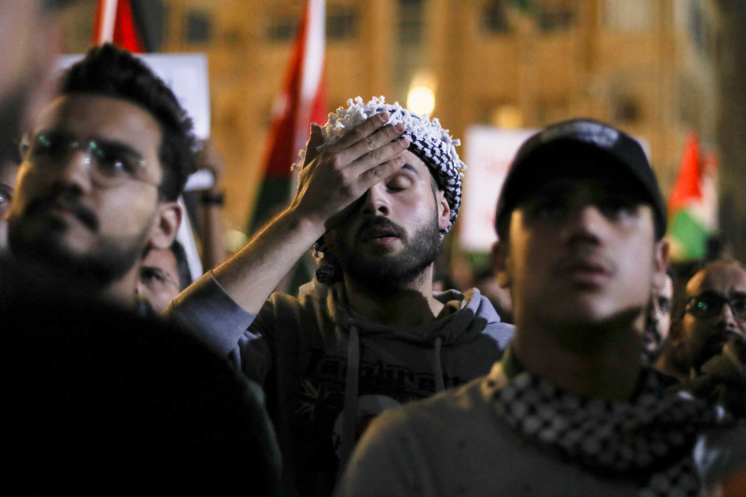 A man reacts as Jordanians gather during a protest in support of Palestinians in Gaza, amid the ongoing conflict between Israel and Palestinian Islamist group Hamas, near the Israeli embassy, in Amman, Jordan, October 24, 2023. REUTERS