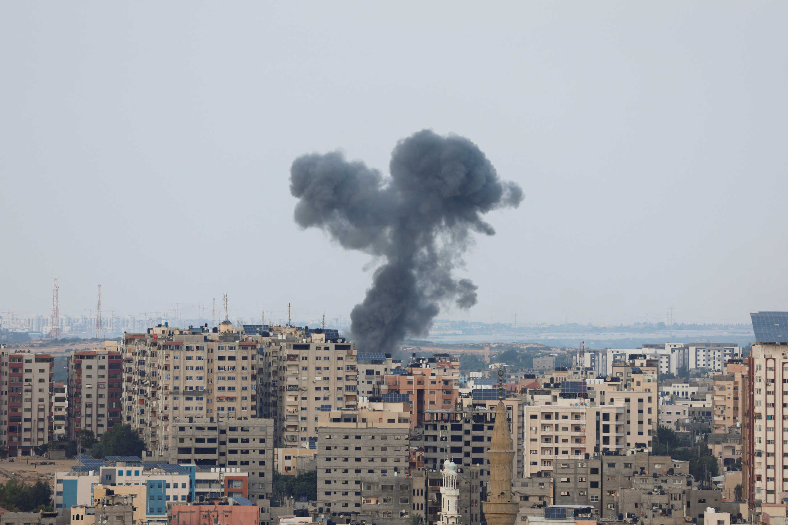 Smoke rises following Israeli strikes in Gaza, October 8, 2023. REUTERS