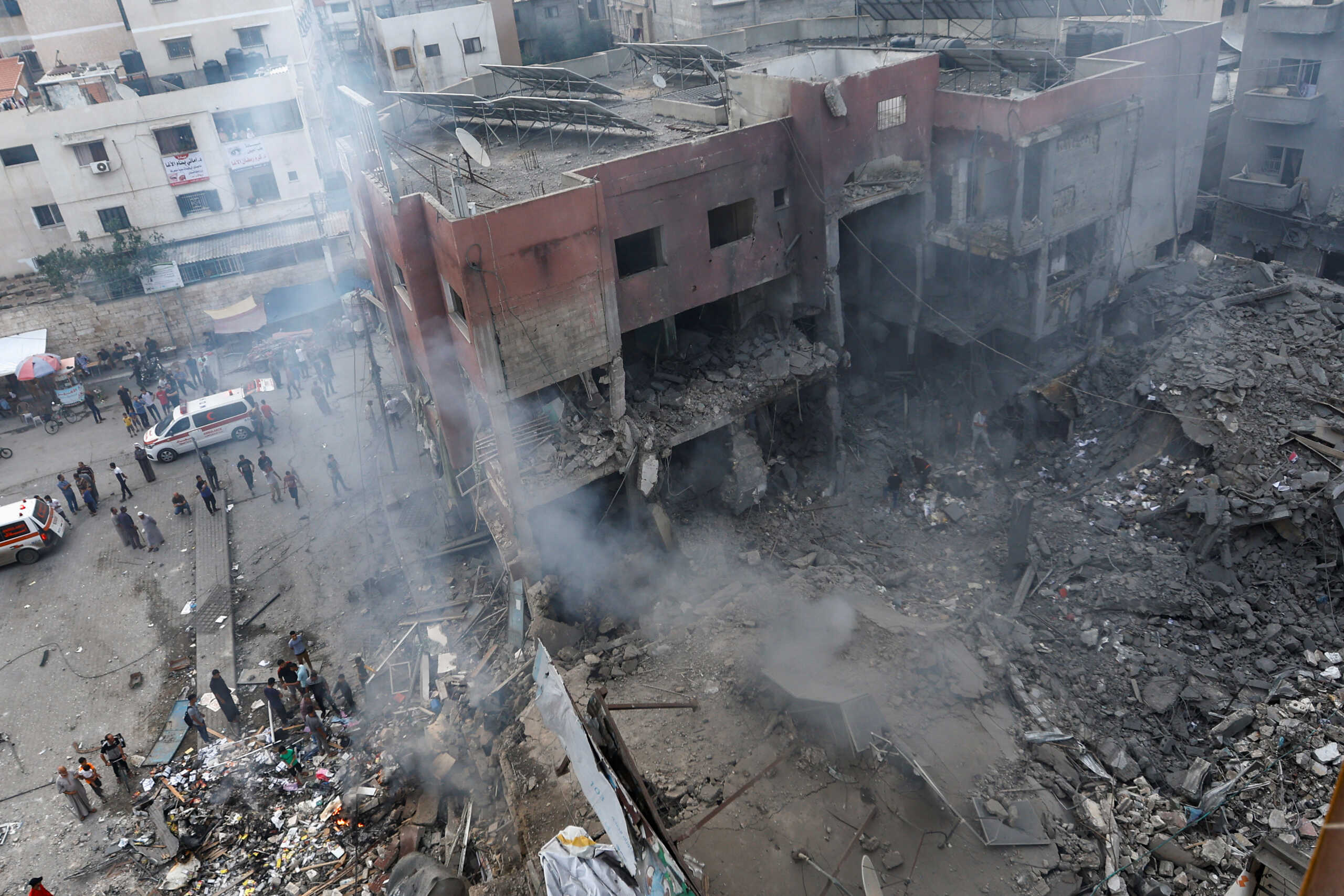 Palestinians inspect the damage in the aftermath of Israeli strikes, in Khan Younis, southern Gaza Strip October 10, 2023. REUTERS