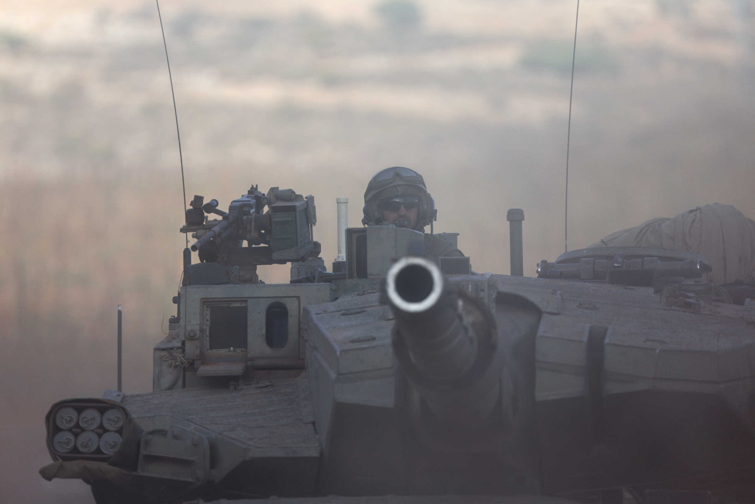 An Israeli soldier uses a tank during a military drill near Israel's border with Lebanon in northern Israel, October 26, 2023. REUTERS