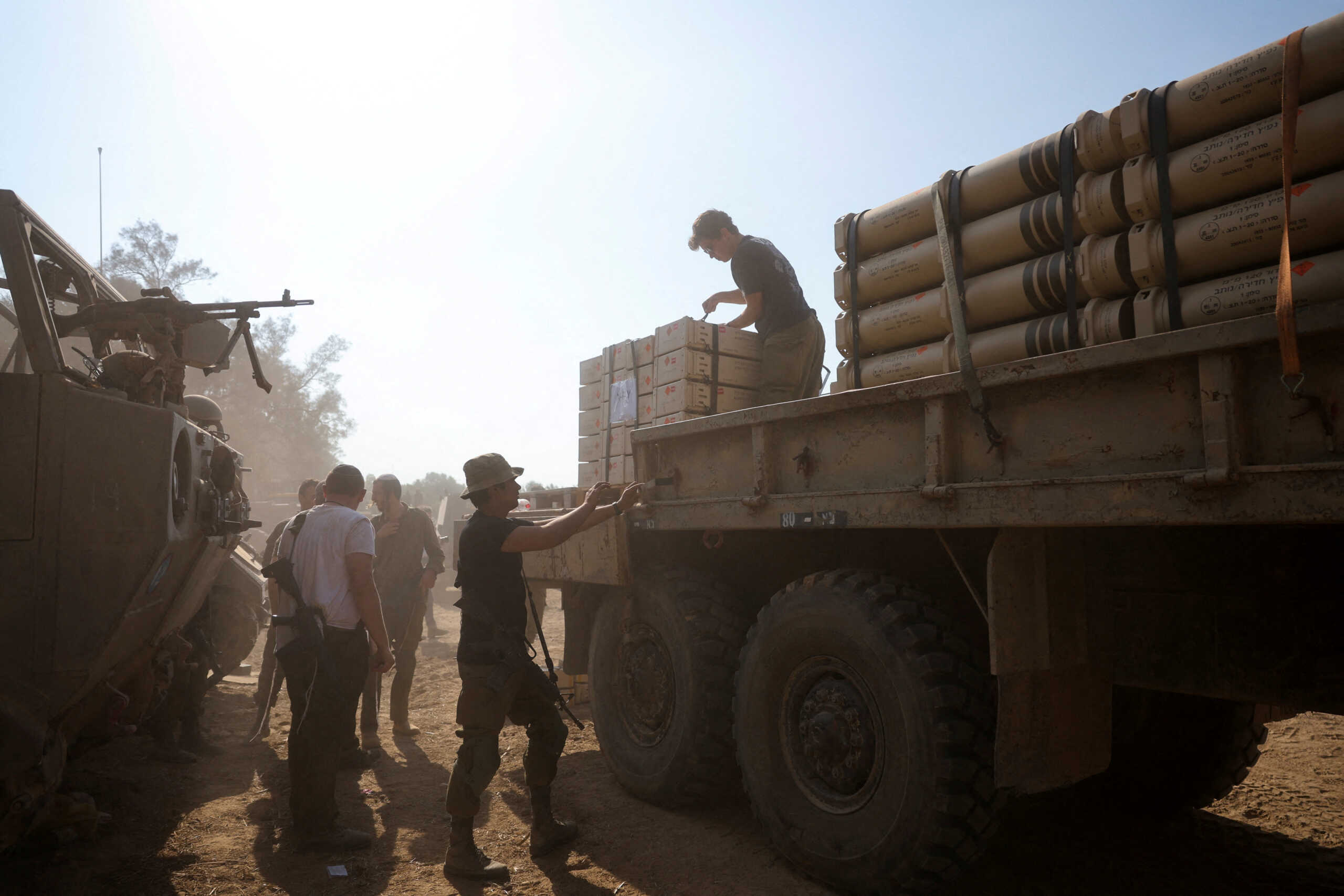 Israeli soldiers are seen, in the aftermath of a mass infiltration by Hamas gunmen from the Gaza Strip, in Kibbutz Beeri in southern Israel, October 14, 2023. REUTERS