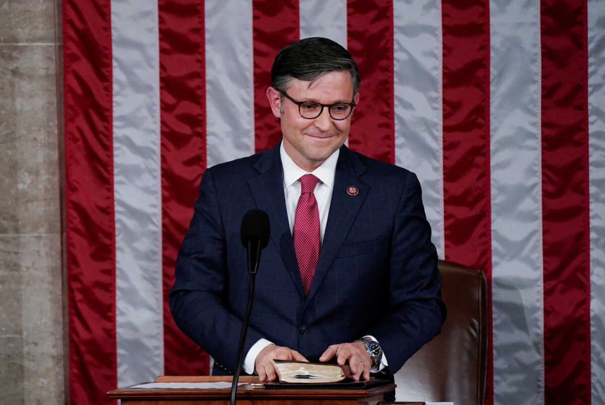Newly elected Speaker of the House Mike Johnson (R-LA) smiles as he reacts to the applause of members of the House after being elected to be the new Speaker at the U.S. Capitol in Washington, U.S., October 25, 2023. REUTERS