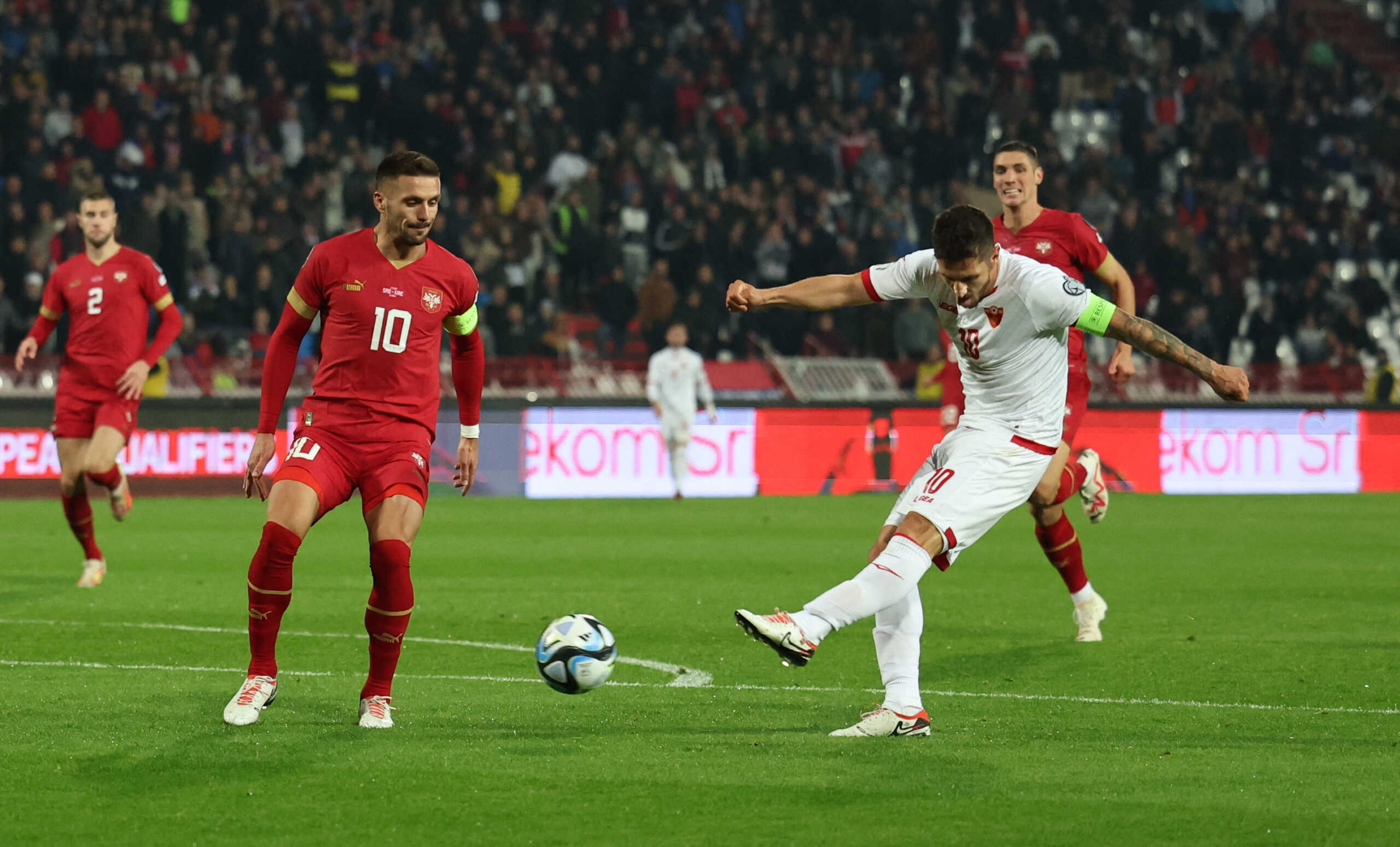 Soccer Football - Euro 2024 Qualifier - Group G - Serbia v Montenegro - Rajko Mitic Stadium, Belgrade, Serbia - October 17, 2023  Montenegro's Stevan Jovetic scores their first goal REUTERS