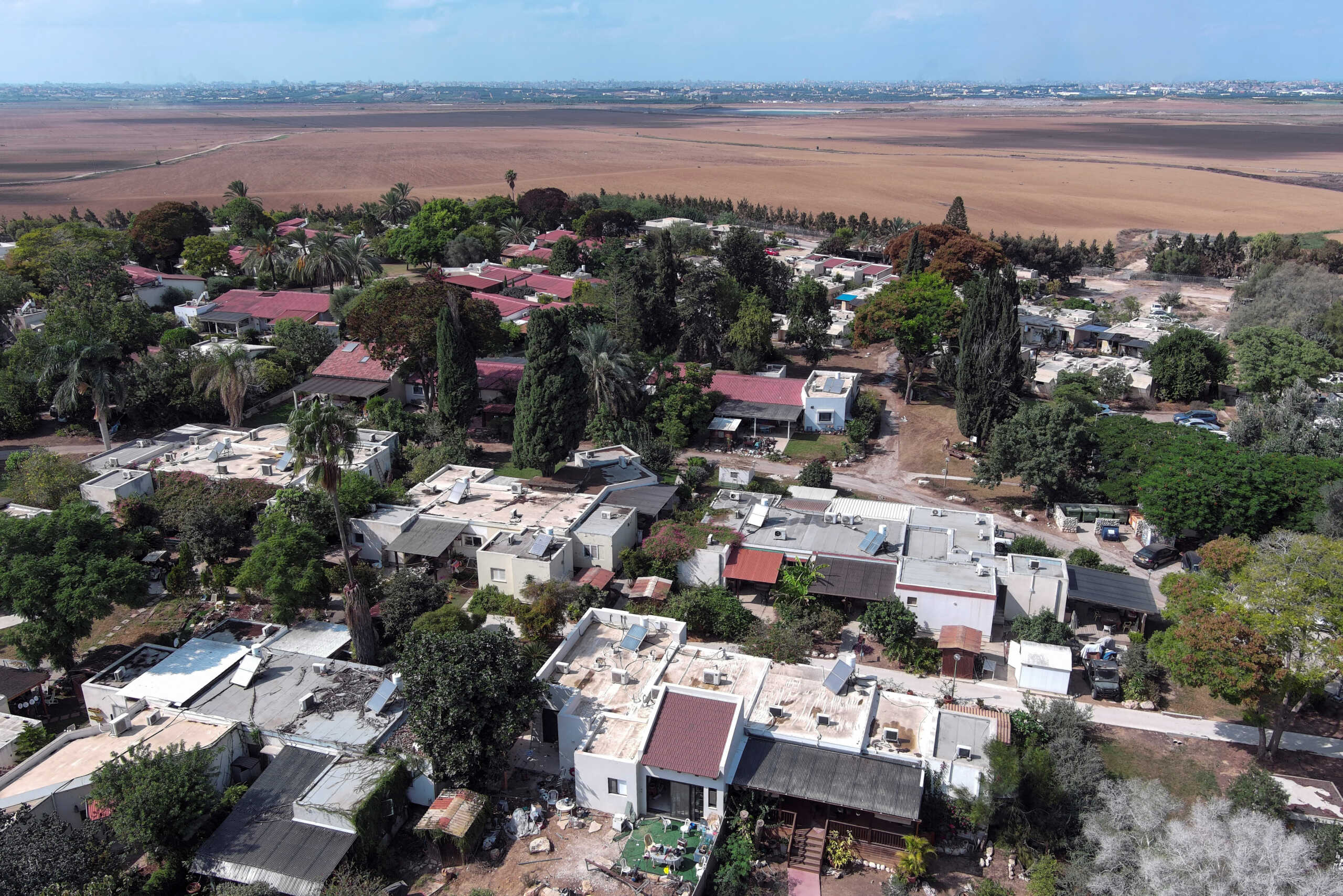 An aerial view shows Kibbutz Krar Aza following a mass infiltration by Hamas gunmen from the Gaza Strip, in southern Israel, October 10, 2023. REUTERS
