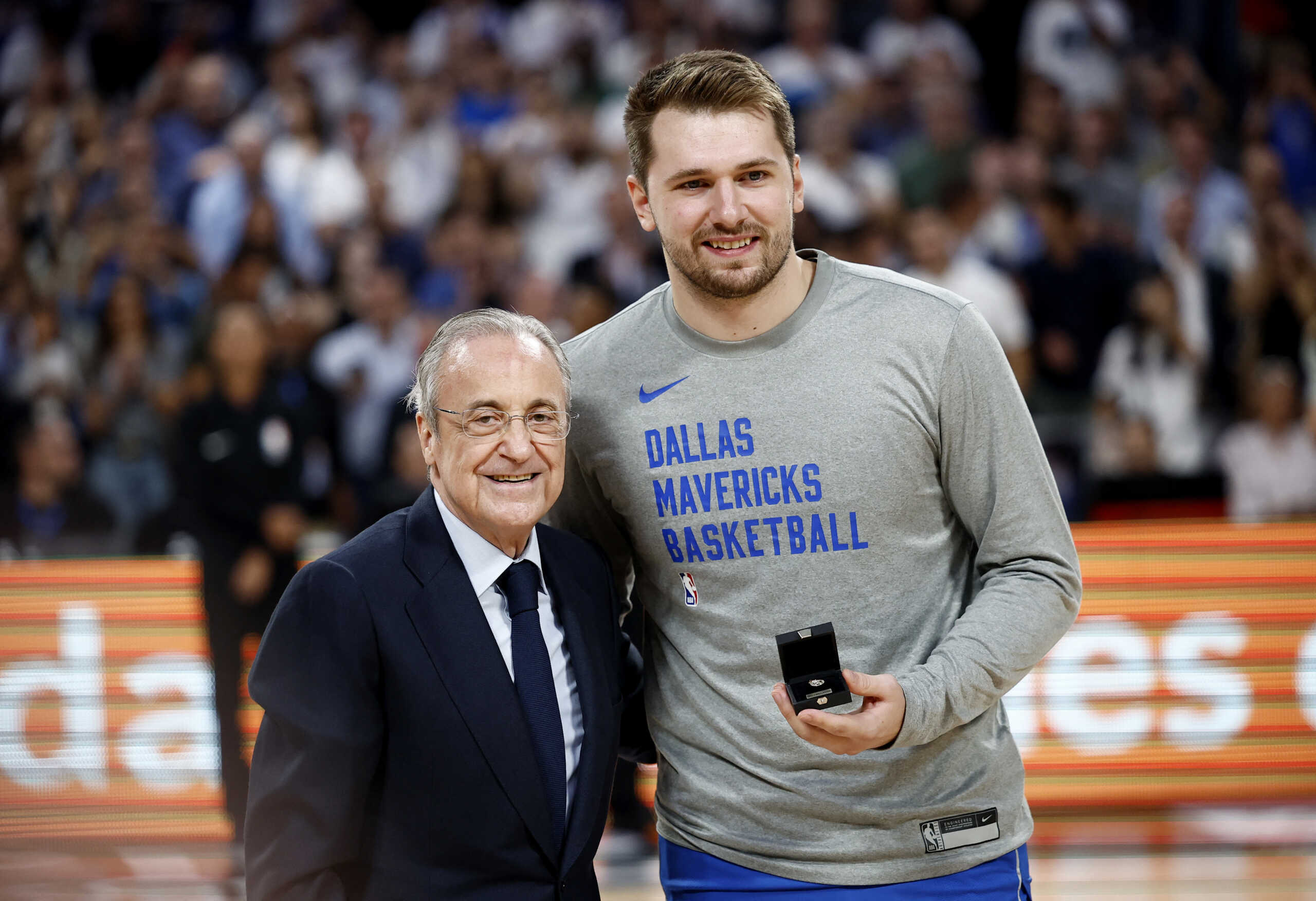Basketball - International Friendly - Real Madrid v Dallas Mavericks - WiZink Center, Madrid, Spain - October 10, 2023 Real Madrid president Florentino Perez gives a badge to Dallas Mavericks' Luka Doncic before the match REUTERS