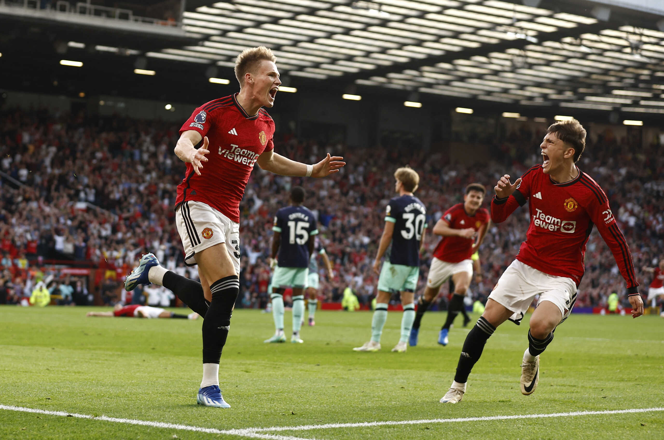 Soccer Football - Premier League - Manchester United v Brentford - Old Trafford, Manchester, Britain - October 7, 2023 Manchester United's Scott McTominay celebrates scoring their second goal with Alejandro Garnacho Action Images via Reuters