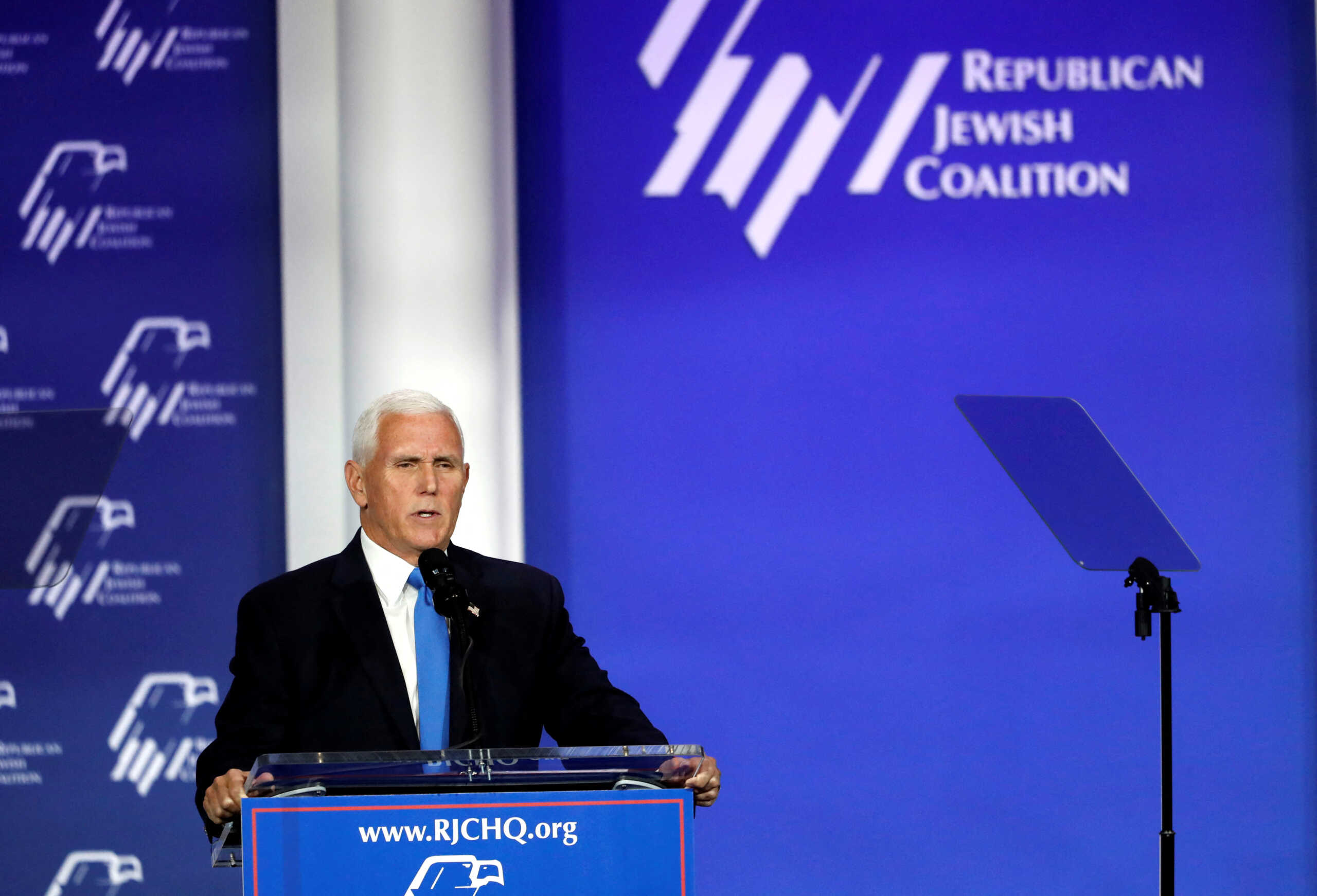 Former U.S. Vice President Mike Pence announces that is withdrawing from the presidential campaign during the Republican Jewish Coalition Annual Leadership Summit in Las Vegas, Nevada, U.S. October 28, 2023. REUTERS
