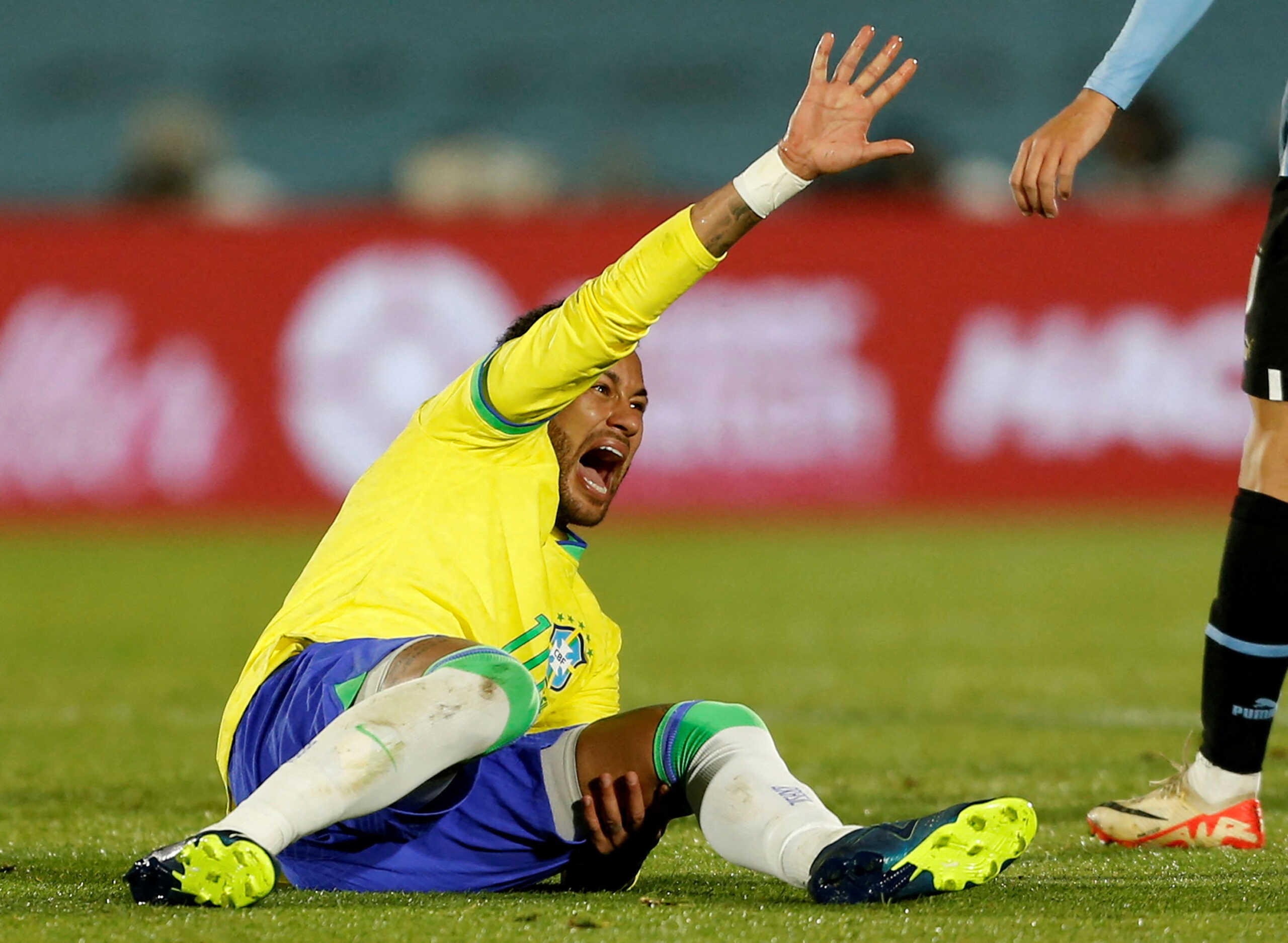 Soccer Football - World Cup - South American Qualifiers - Uruguay v Brazil - Estadio Centenario, Montevideo, Uruguay - October 17, 2023 Brazil's Neymar reacts after sustaining an injury REUTERS