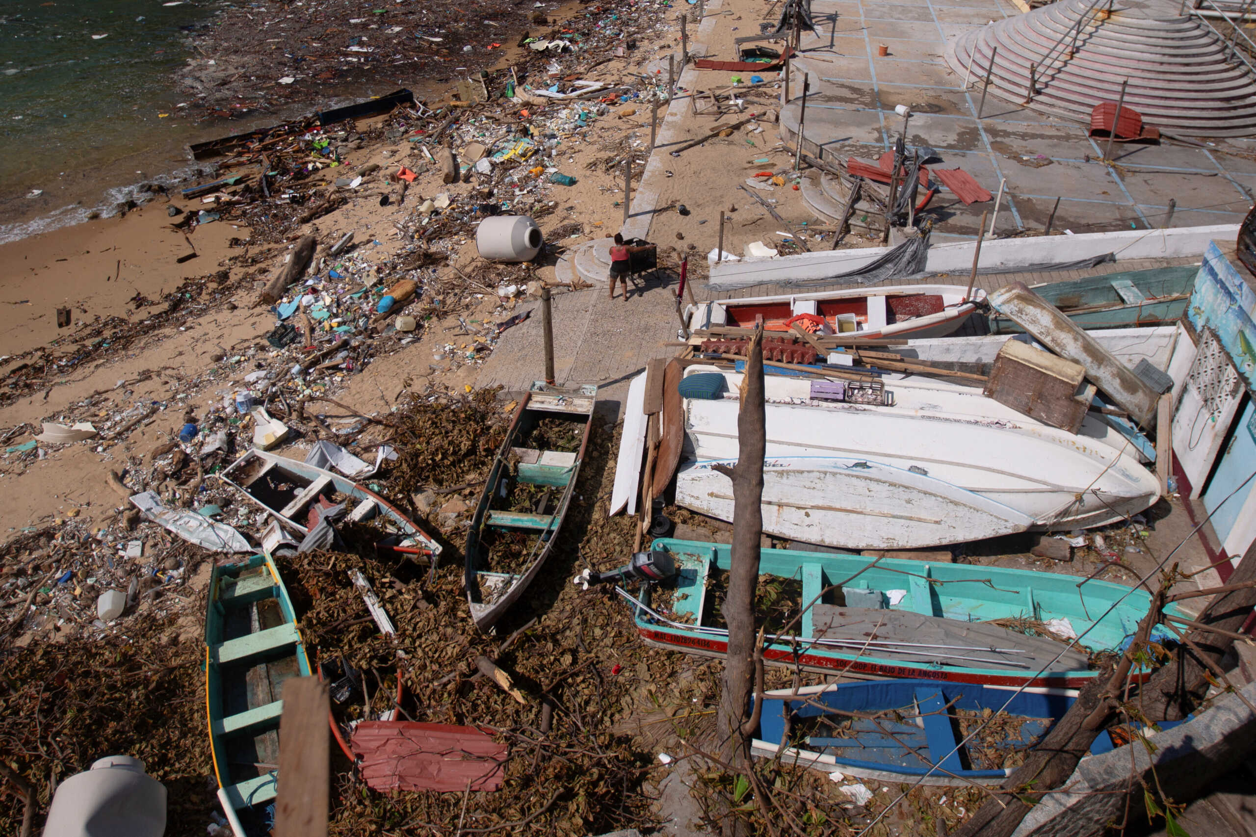 Debris lies on La Angosta Beach, in the aftermath of Hurricane Otis, in Acapulco, Mexico, October 30, 2023. REUTERS