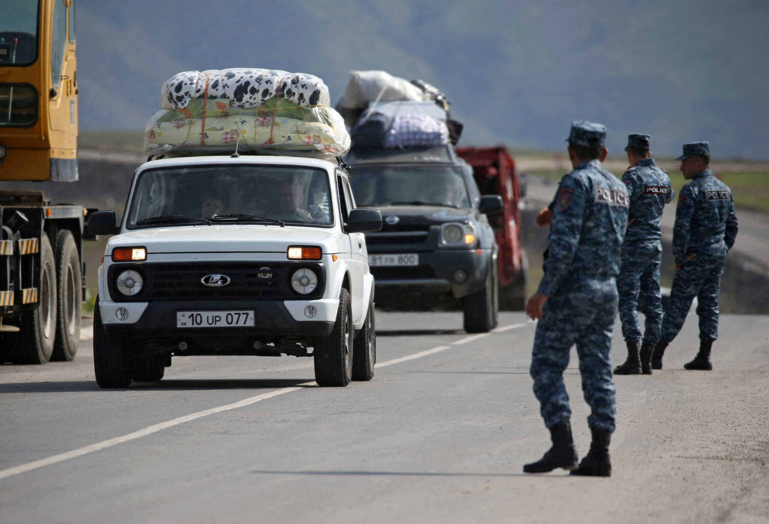 FILE PHOTO: Refugees from Nagorno-Karabakh region arrive in the border village of Kornidzor, Armenia, September 29, 2023. REUTERS