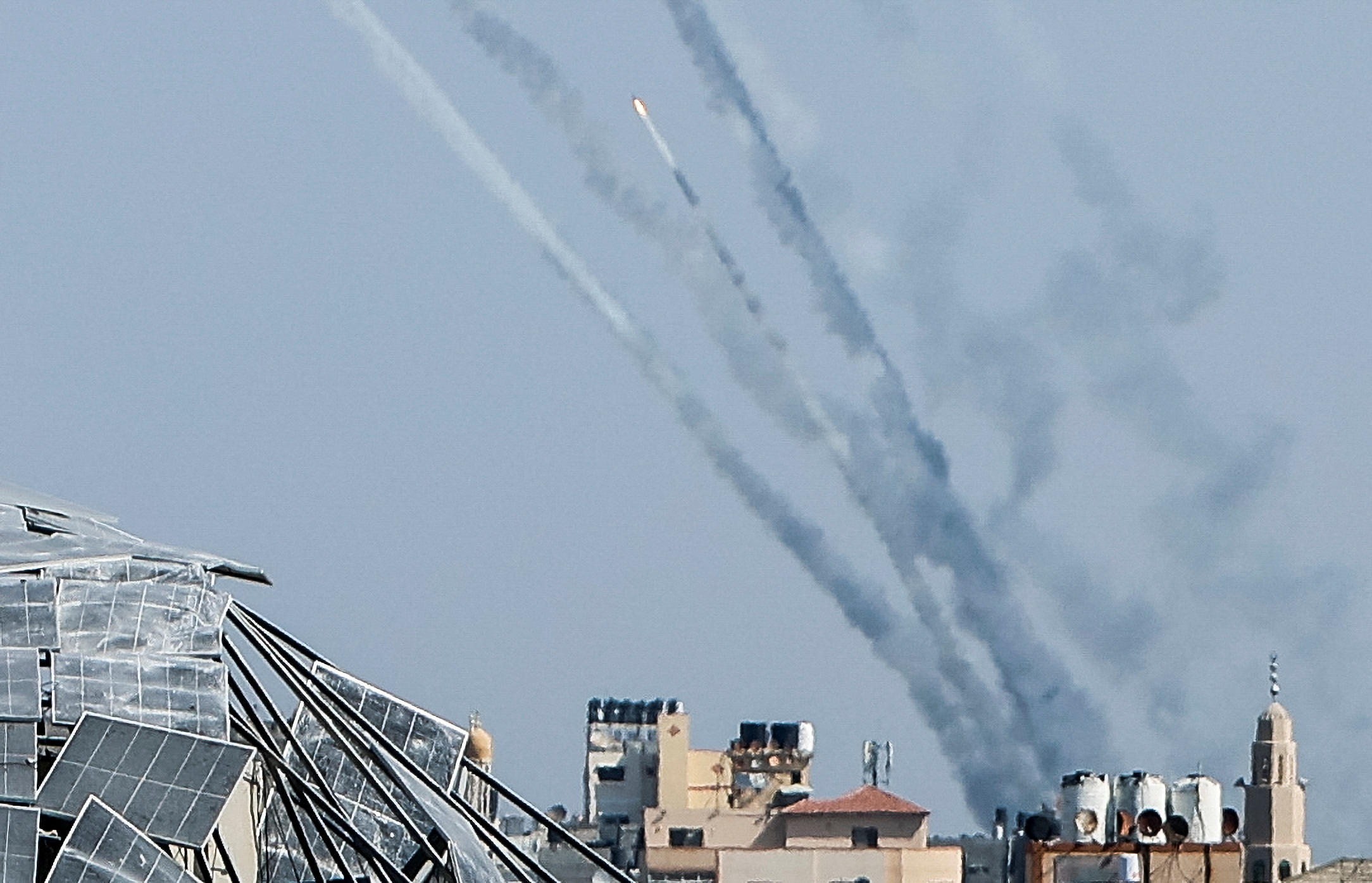 Rockets are fired from Gaza towards Israel, in Gaza, October 13, 2023. REUTERS