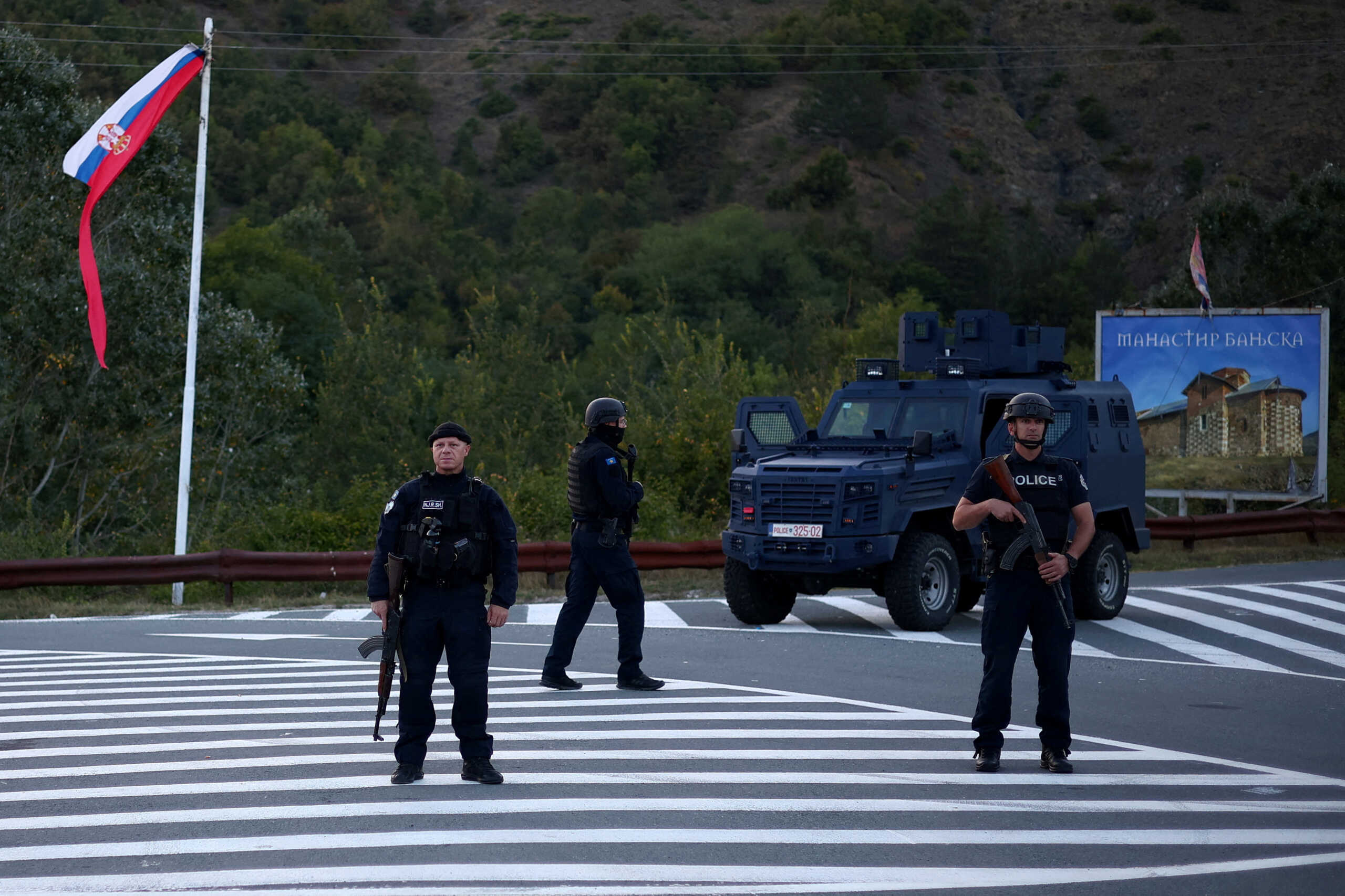 FILE PHOTO: Kosovo special police officers patrol a road to Banjska monastery, in the aftermath of a shooting incident, near Zvecan, Kosovo September 26, 2023. REUTERS