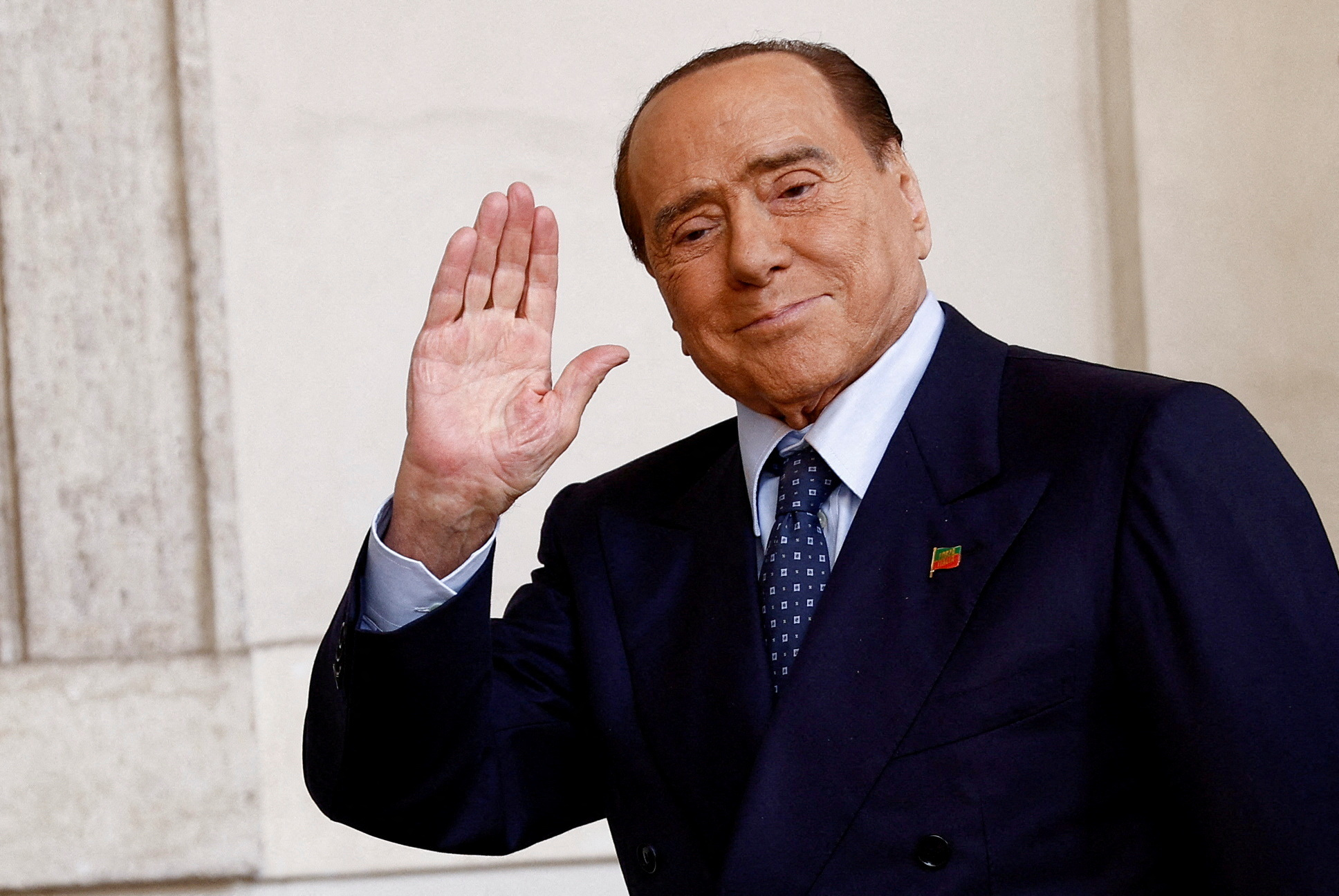 FILE PHOTO: Forza Italia leader and former Prime Minister Silvio Berlusconi arrives for a meeting with Italian President Sergio Mattarella at the Quirinale Palace in Rome, Italy October 21, 2022. REUTERS