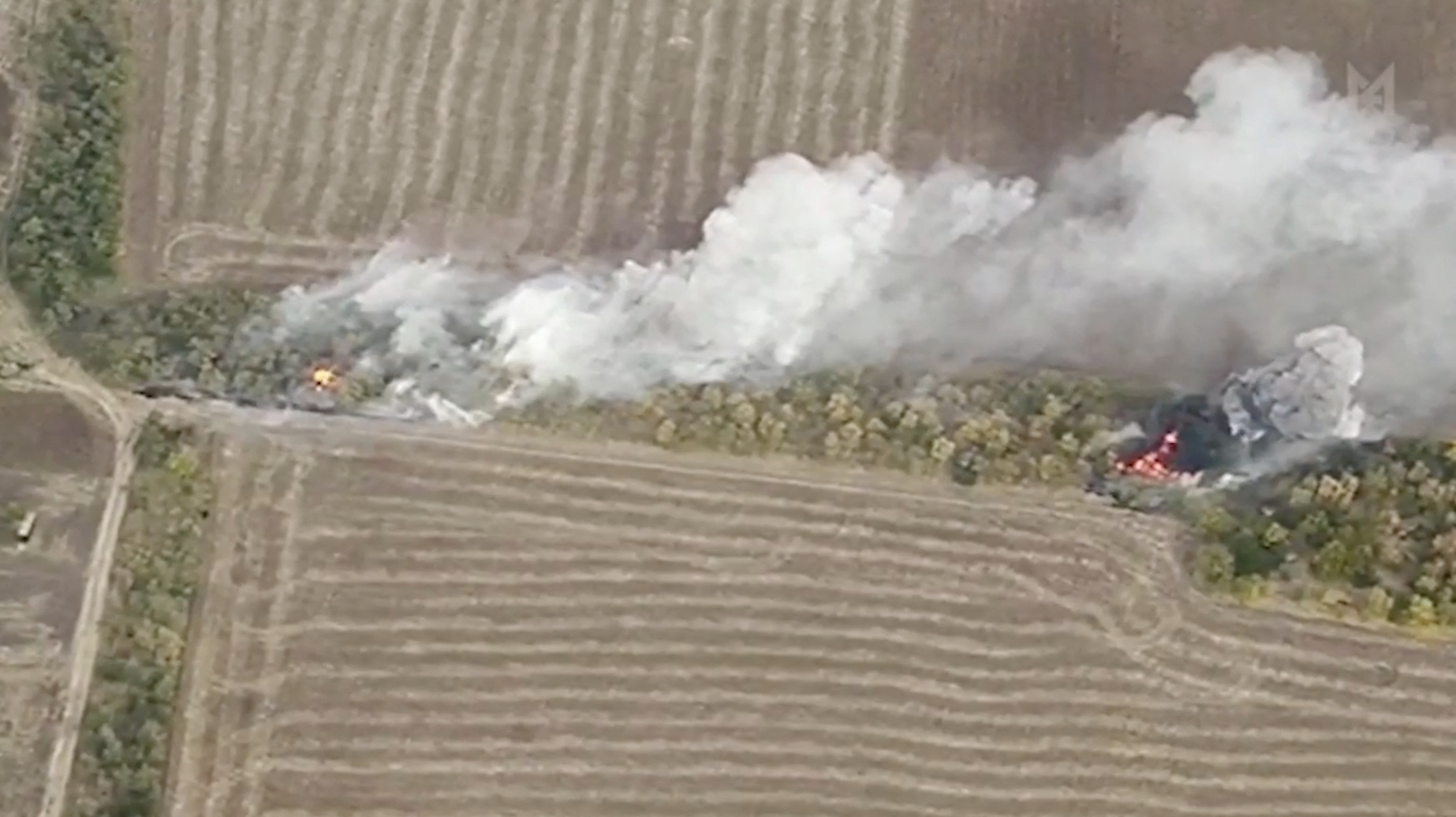 A still picture from a drone footage shows military hardware on fire near Svitle in Zaporizhzhia region, Ukraine, video released on October 3, 2023. Special Operations Forces Of The Ukraine Army