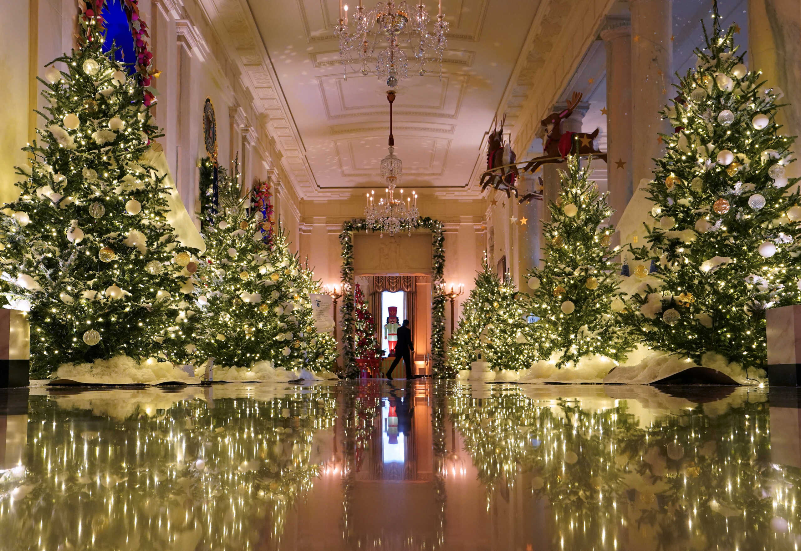 Decorations adorn the Cross Hall during a media preview of the "Magic, Wonder and Joy" theme holiday decorations at the White House in Washington, U.S., November 27, 2023. REUTERS