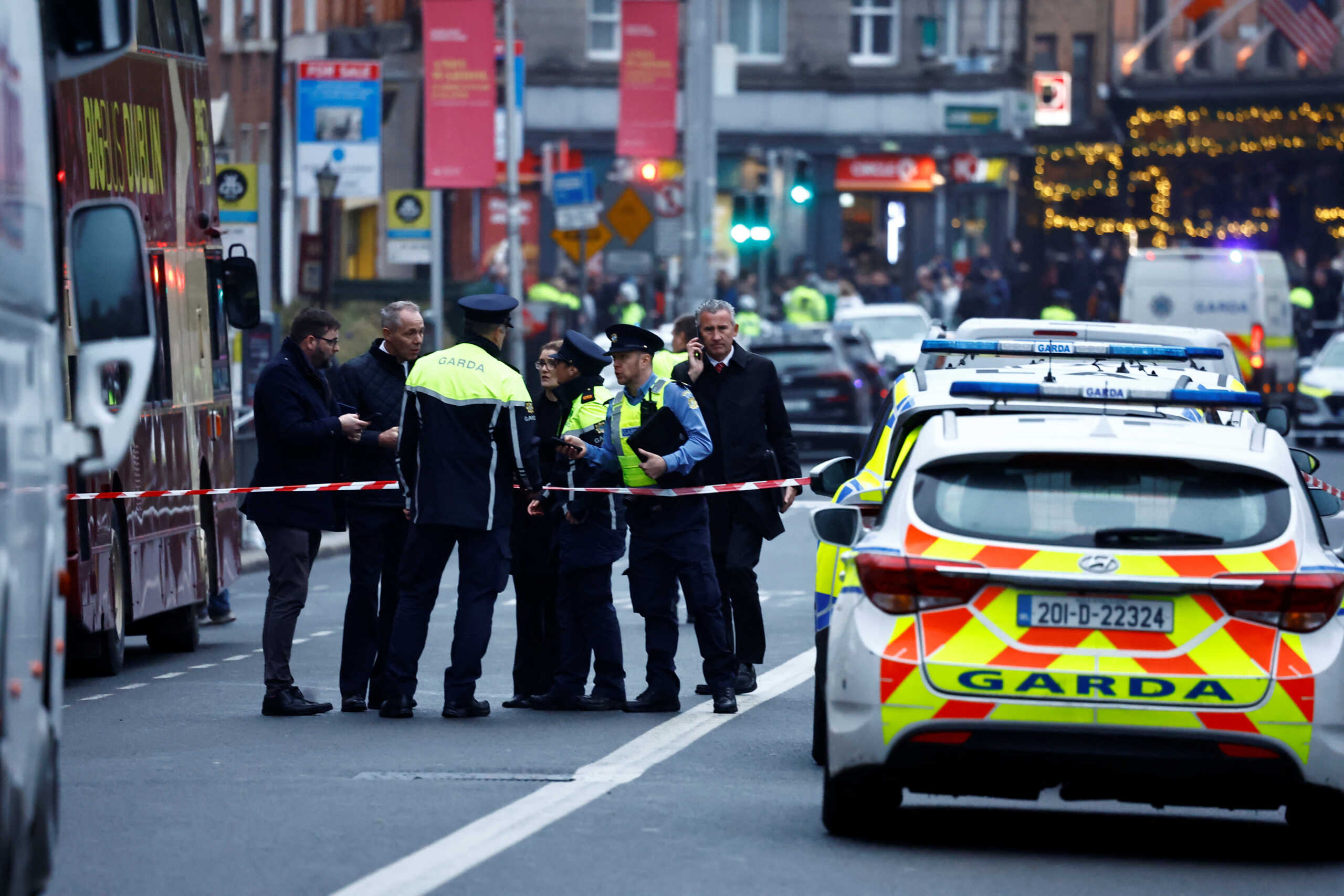 Police officers work at the scene of a suspected stabbing that left few children injured in Dublin, Ireland, November 23, 2023. REUTERS
