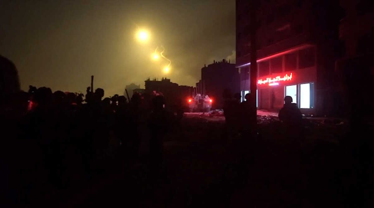 Footage shows flares in the sky and what the Israeli army says are their armed forces being deployed in Gaza, in this still image from video obtained by Reuters on November 9, 2023. Israeli Army Handout