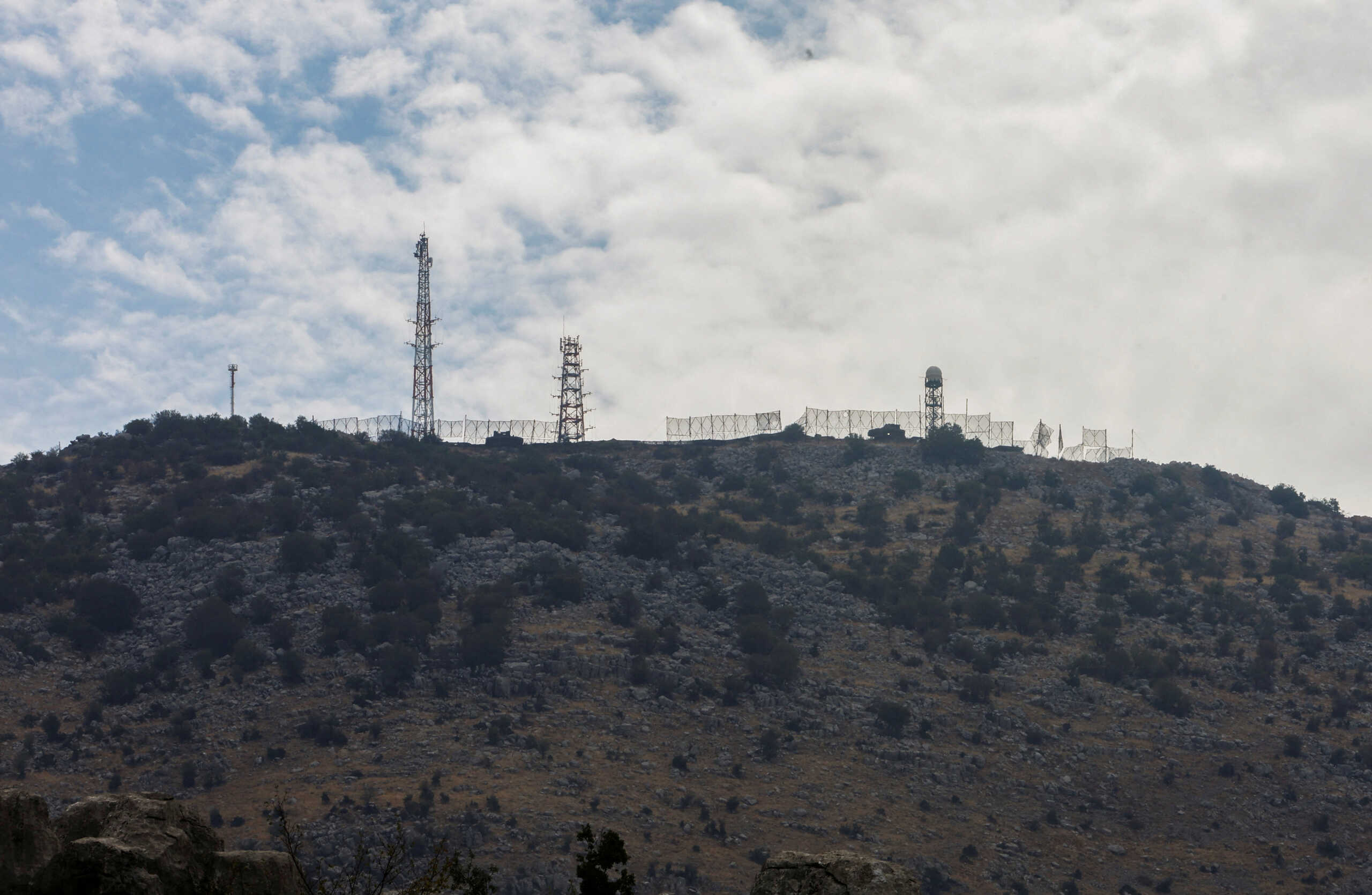 FILE PHOTO: A view shows Israeli positions in the Israeli-occupied Shebaa farms as pictured from Kfarchouba, near the border with Israel, southern Lebanon, October 8, 2023. REUTERS