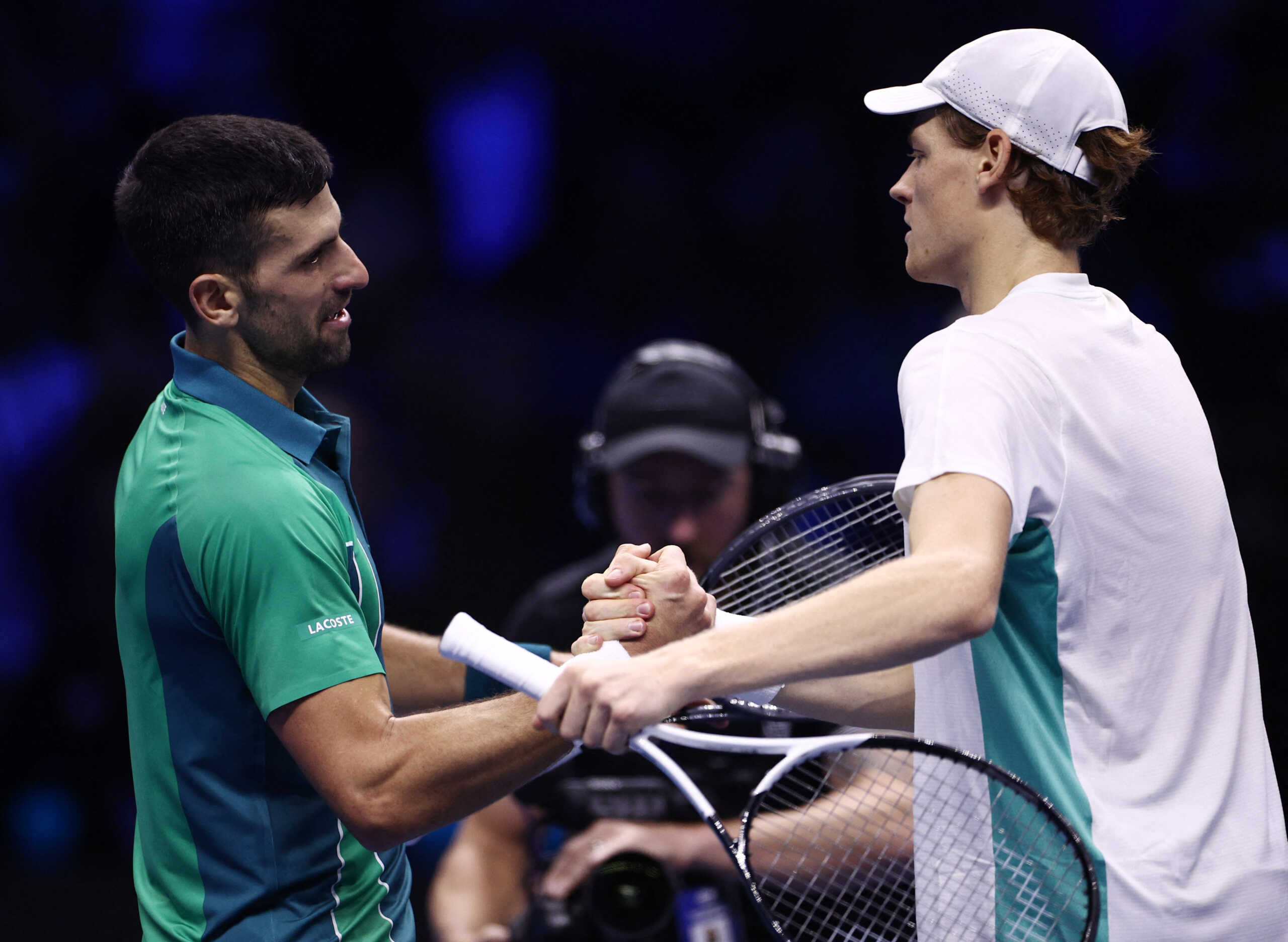 Tennis - ATP Finals - Pala Alpitour, Turin, Italy - November 15, 2023 Italy's Jannik Sinner shakes hands with Serbia's Novak Djokovic after winning their group stage match REUTERS