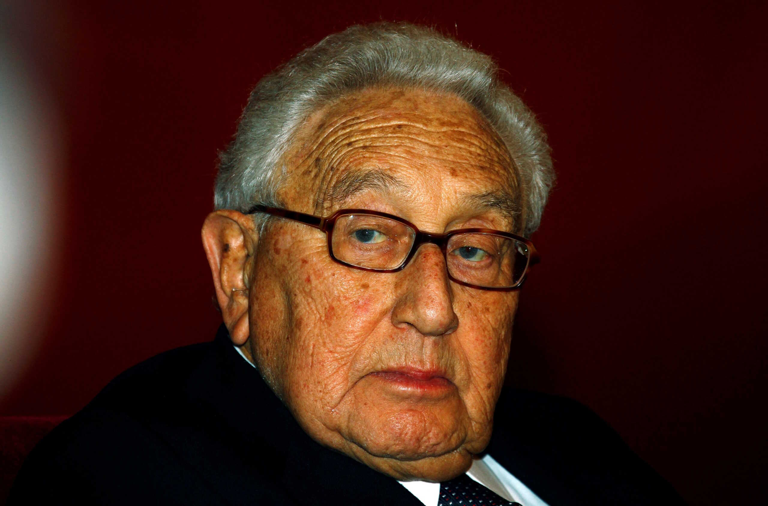 FILE PHOTO: Former U.S. Secretary of State Henry Kissinger listens to Chinese Vice-President Xi Jinping (not pictured) speak, during celebrations to mark the 40th anniversary of President Richard Nixon's historic visit to China, in Beijing, China January 16, 2012. REUTERS