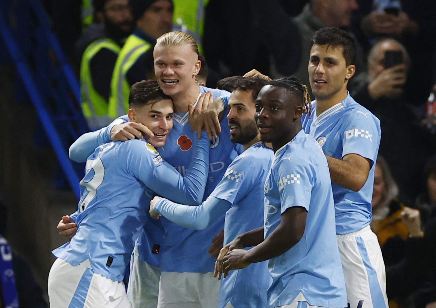 Soccer Football - Premier League - Chelsea v Manchester City - Stamford Bridge, London, Britain - November 12, 2023 Manchester City's Erling Braut Haaland celebrates scoring their third goal with teammates Action Images via Reuters