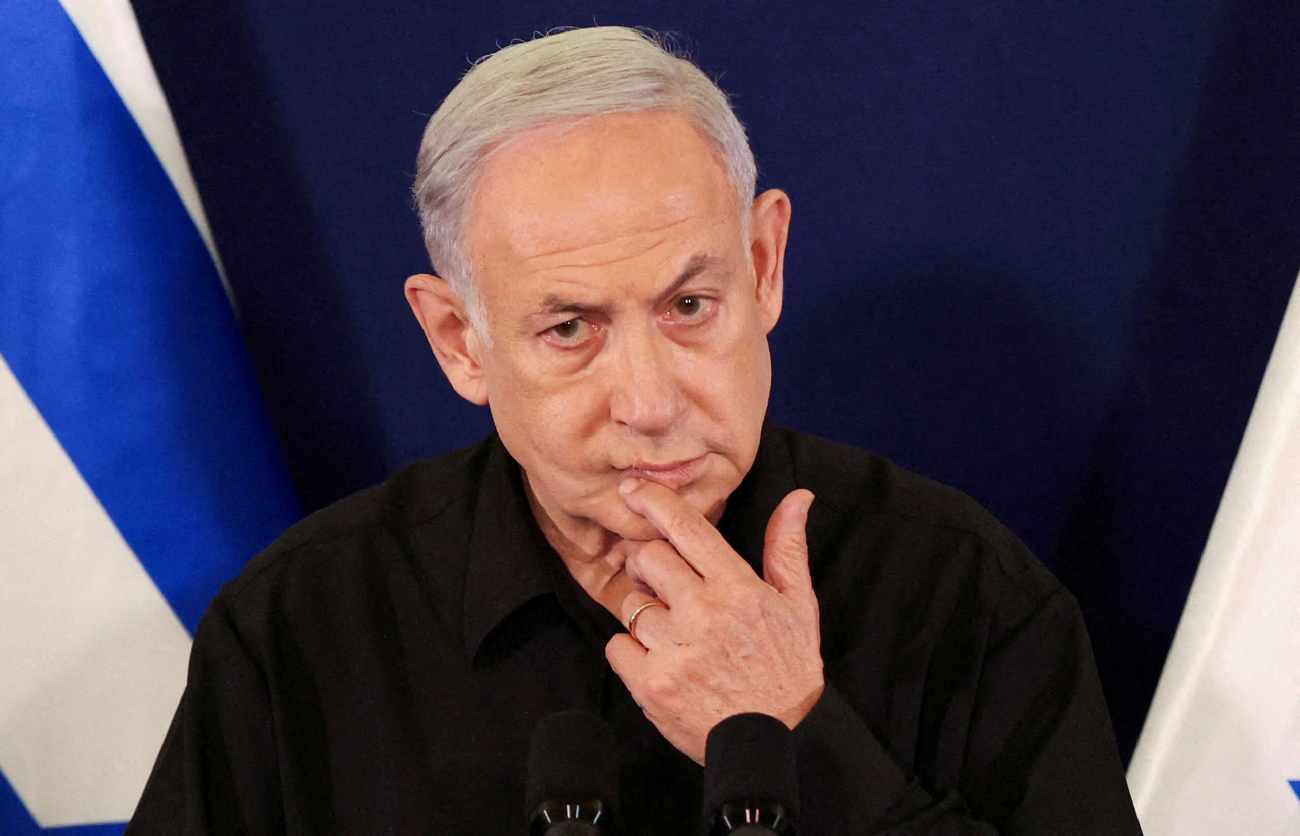 FILE PHOTO: Israeli Prime Minister Benjamin Netanyahu speaks during a press conference with Defense Minister Yoav Gallant and Cabinet Minister Benny Gantz in the Kirya military base in Tel Aviv , Israel , 28 October  2023.    ABIR SULTAN POOL