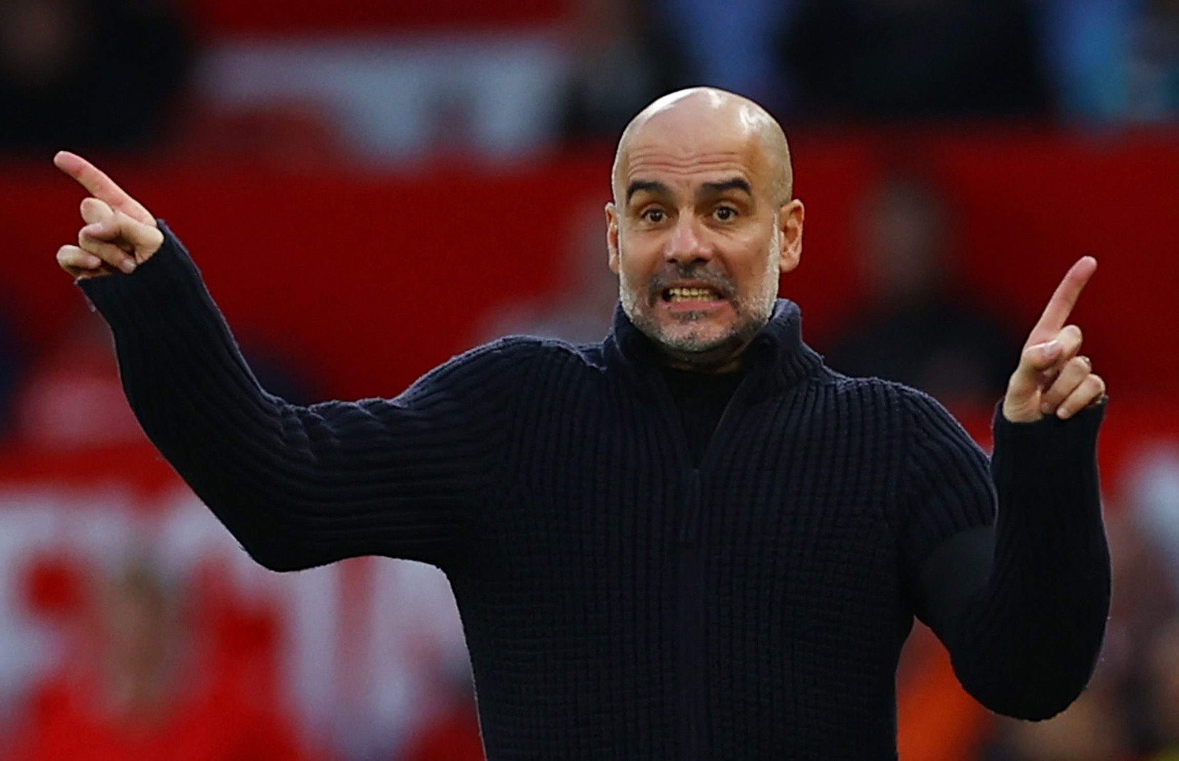 Soccer Football - Premier League - Manchester United v Manchester City - Old Trafford, Manchester, Britain - October 29, 2023  Manchester City manager Pep Guardiola reacts REUTERS