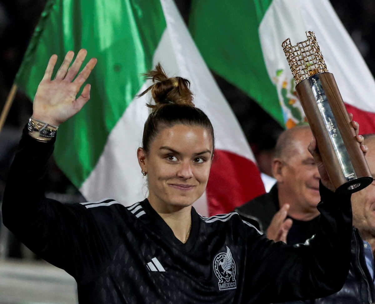 Maria Sakkari of Greece gestures as she holds the trophy after her victory during an exhibition match against Caroline Wozniacki of Denmark, at TennisFest in La Plaza de Toros Mexico, in Mexico City, Mexico, November 29, 2023. REUTERS
