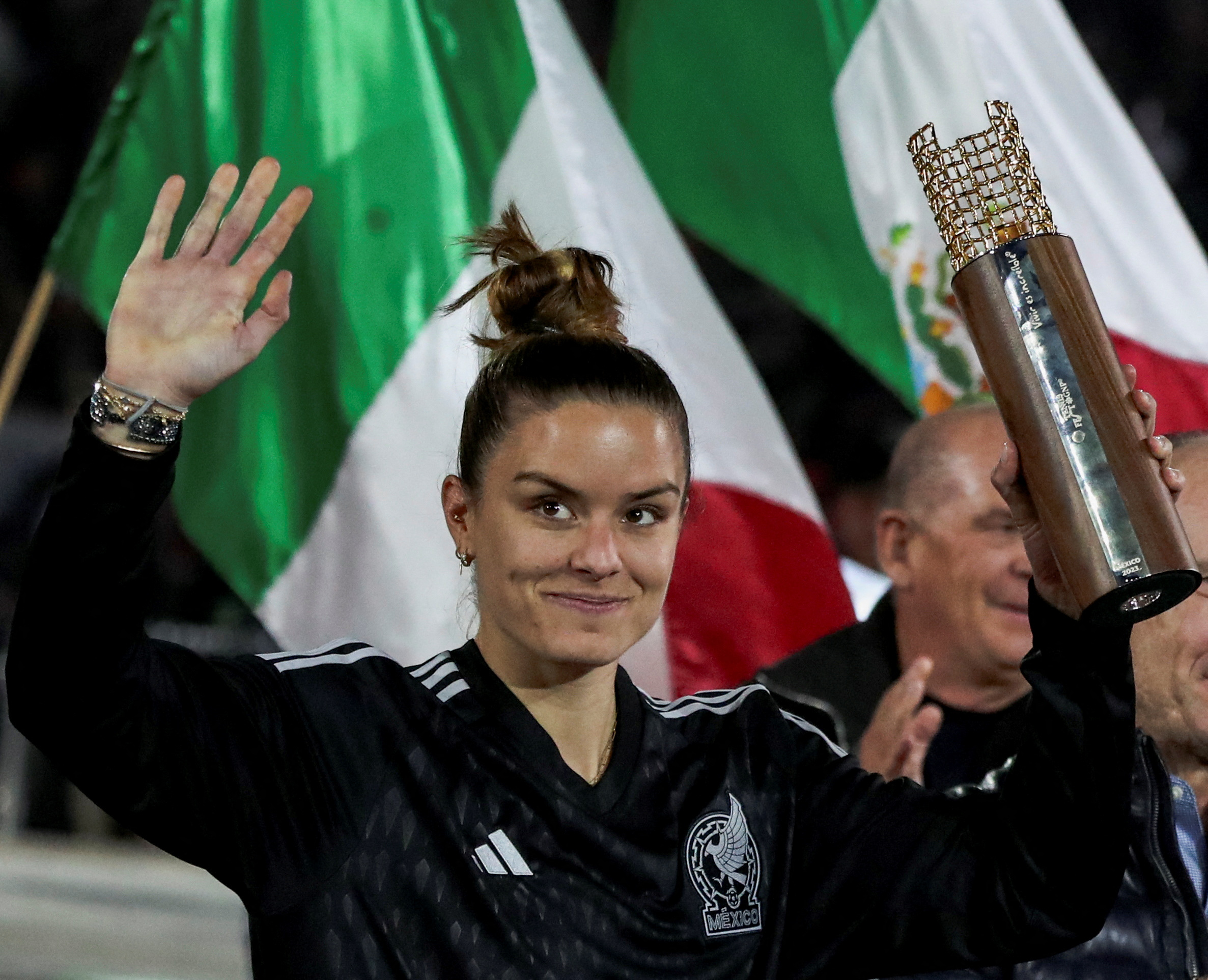 Maria Sakkari of Greece gestures as she holds the trophy after her victory during an exhibition match against Caroline Wozniacki of Denmark, at TennisFest in La Plaza de Toros Mexico, in Mexico City, Mexico, November 29, 2023. REUTERS