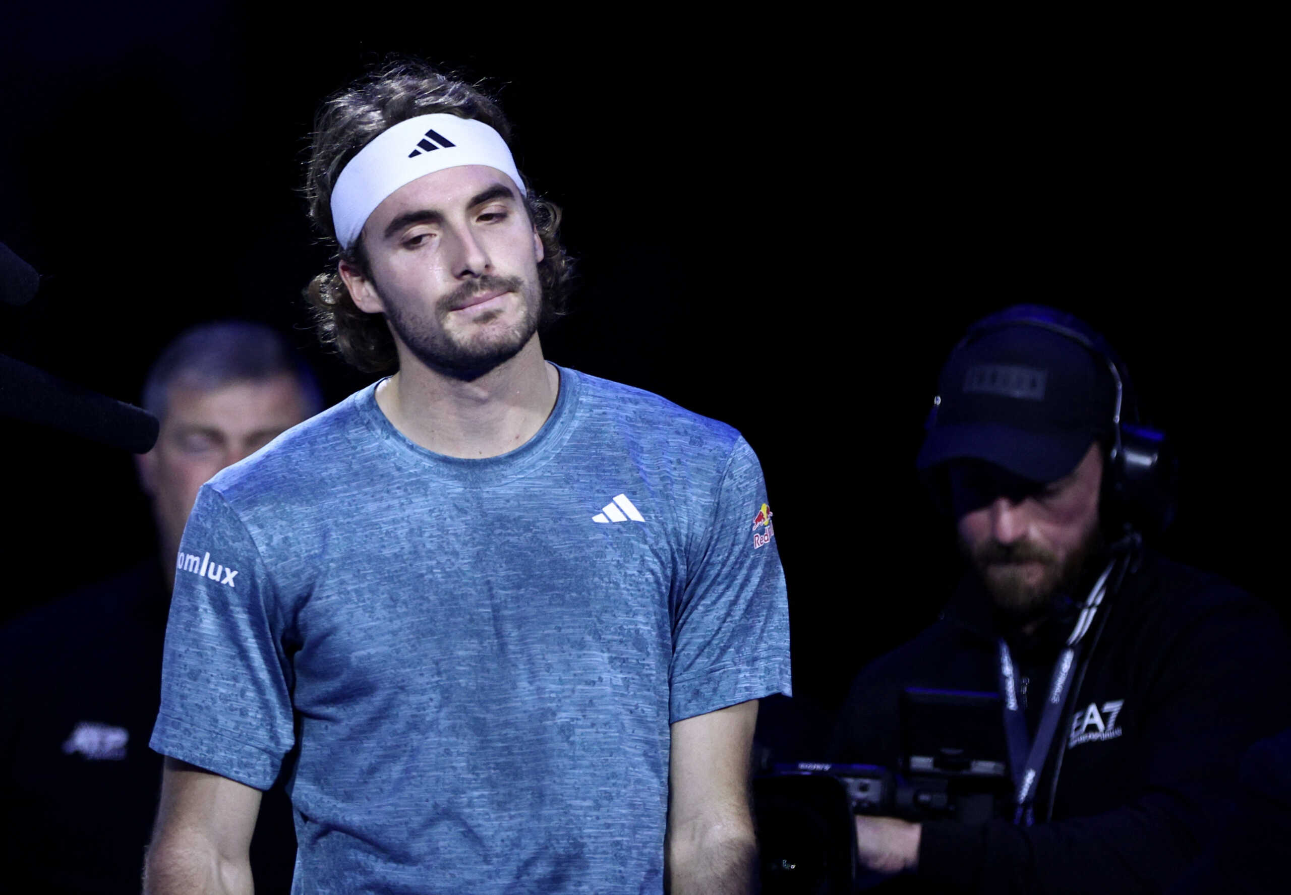 Tennis - ATP Finals - Pala Alpitour, Turin, Italy - November 14, 2023 Greece's Stefanos Tsitsipas reacts after withdrawing from his group stage match against Denmark's Holger Rune REUTERS
