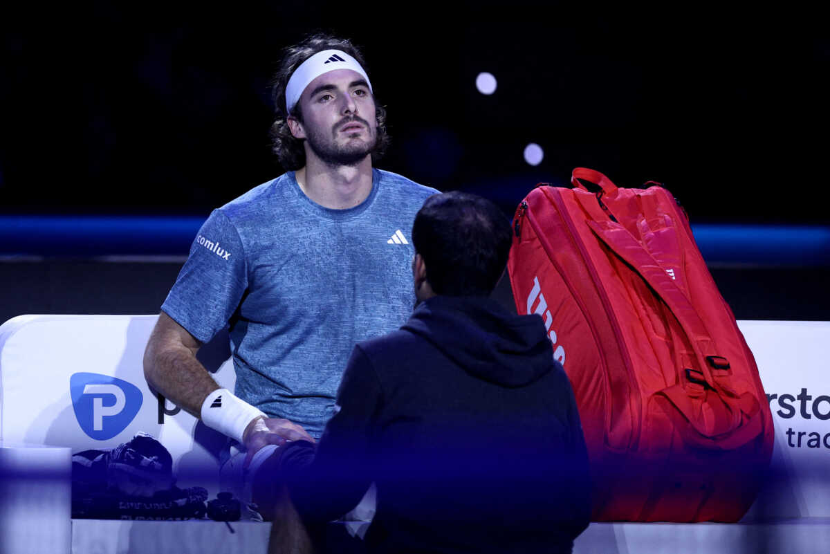 Tennis - ATP Finals - Pala Alpitour, Turin, Italy - November 14, 2023 Greece's Stefanos Tsitsipas reacts after withdrawing from his group stage match against Denmark's Holger Rune REUTERS