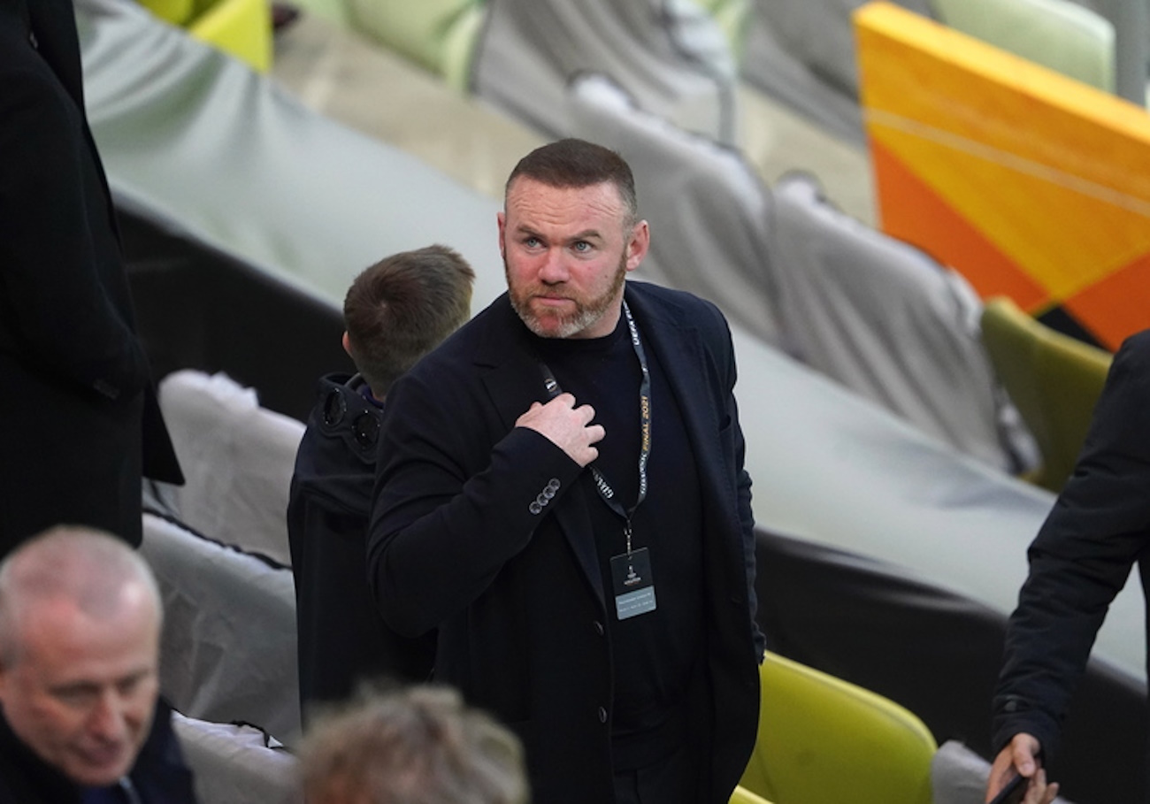 epa09229799 Derby County manager Wayne Rooney (C) attends the UEFA Europa League final soccer match between Villarreal CF and Manchester United in Gdansk, Poland, 26 May 2021.  EPA